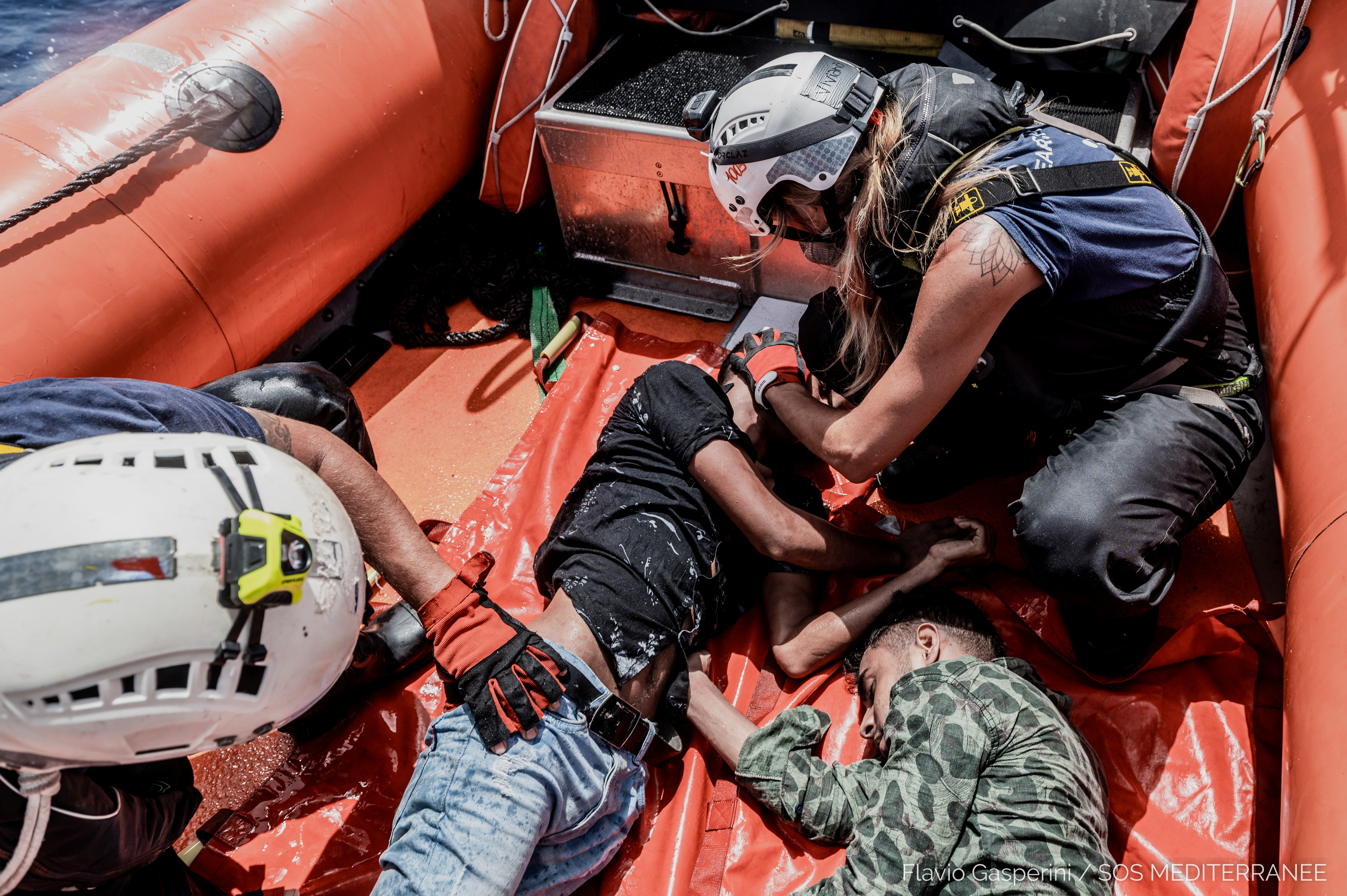 Search and rescue (SAR) team members of the Ocean Viking aid migrants during an SAR operation in the Mediterranean Sea, July 4, 2021. Flavio Gasperini/SOS Mediterranee/Handout via REUTERS 