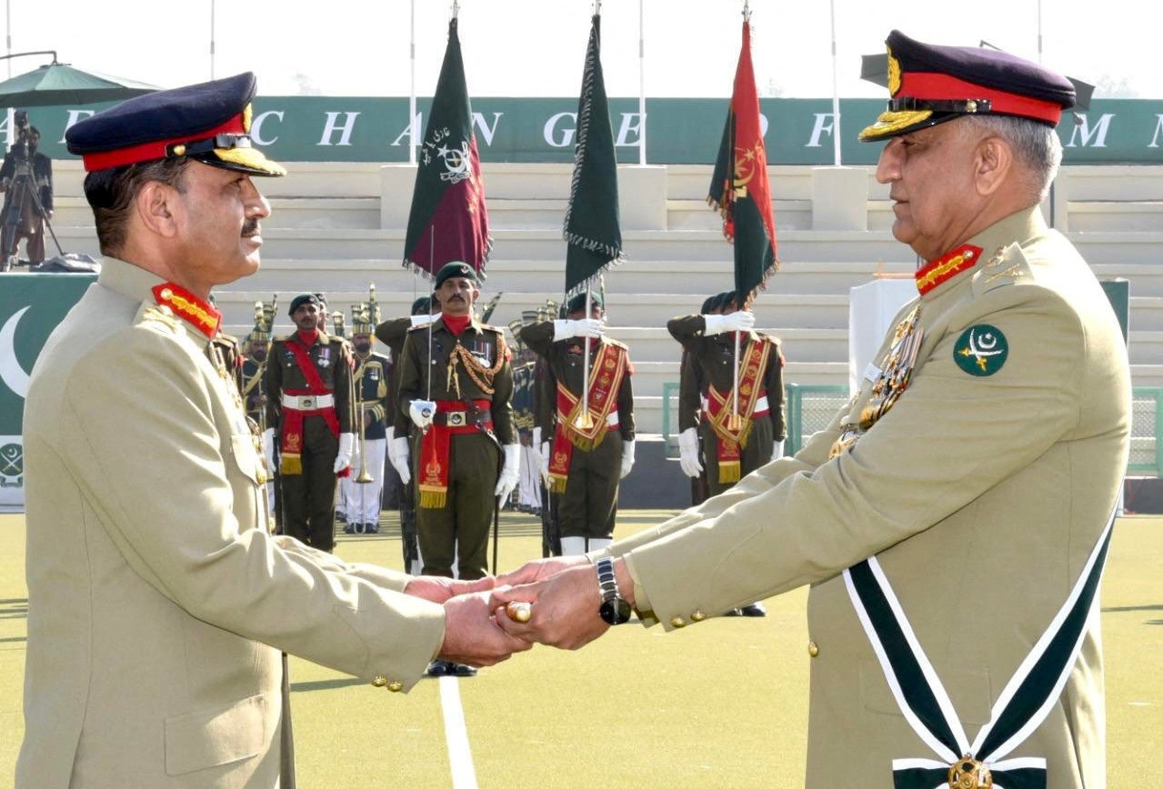 Outgoing chief of army staff General Bajwa hands over the baton of command over to newly appointed army chief General Munir in Rawalpindi