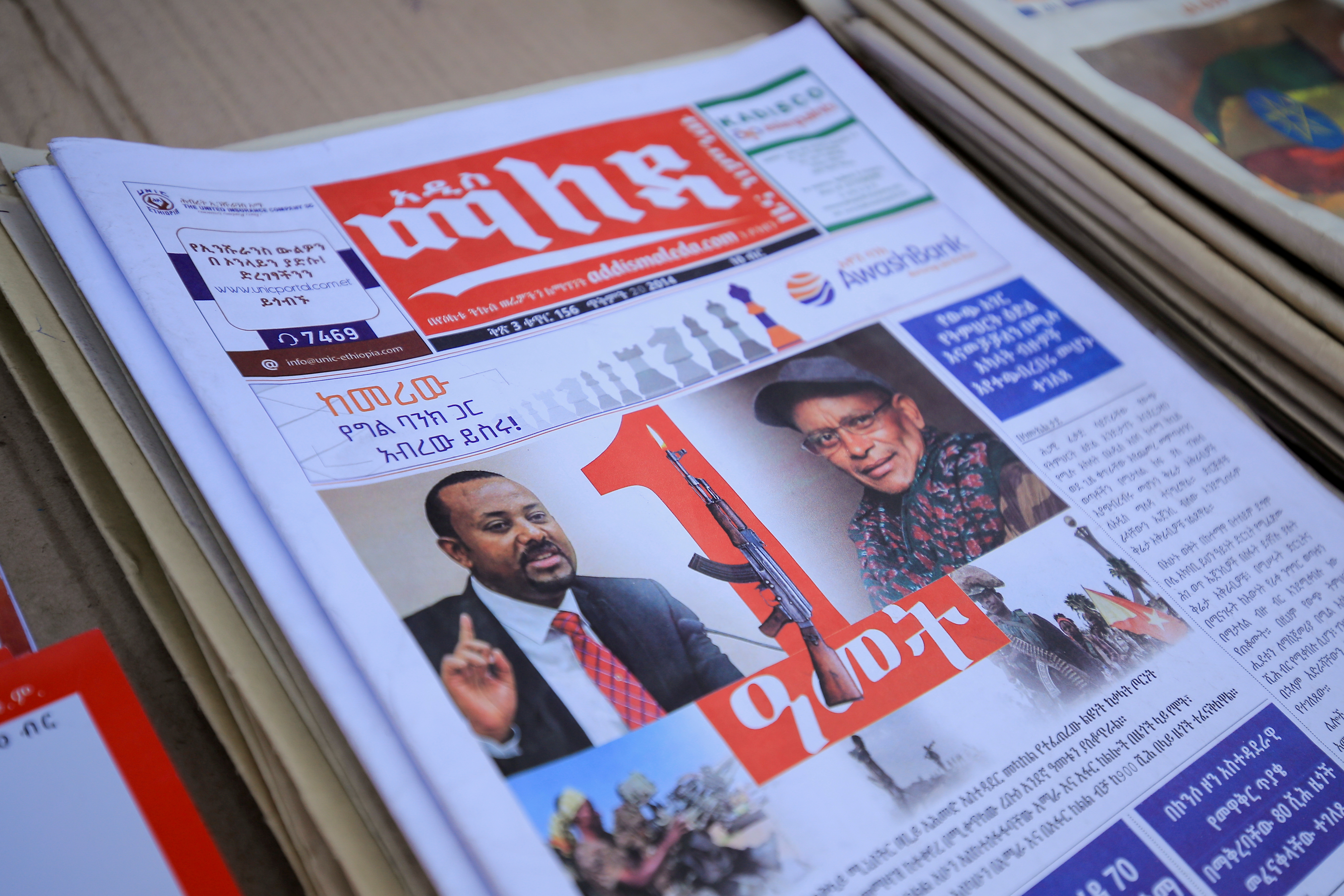 Ethiopia’s Prime Minister Ahmed and leader of the Tigray People's Liberation Front (TPLF) party Gebremichael are pictured on the Maleda Local News papers, in Addis Ababa