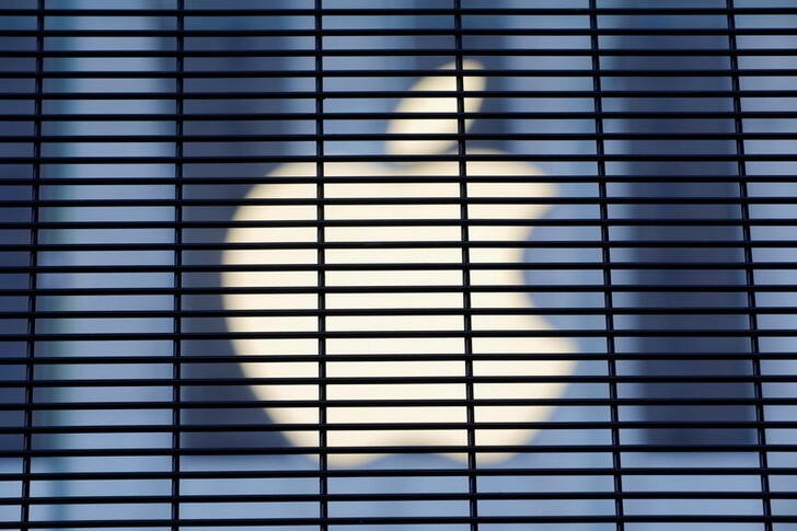 The Apple logo is seen through a security fence erected around the Apple Fifth Avenue store