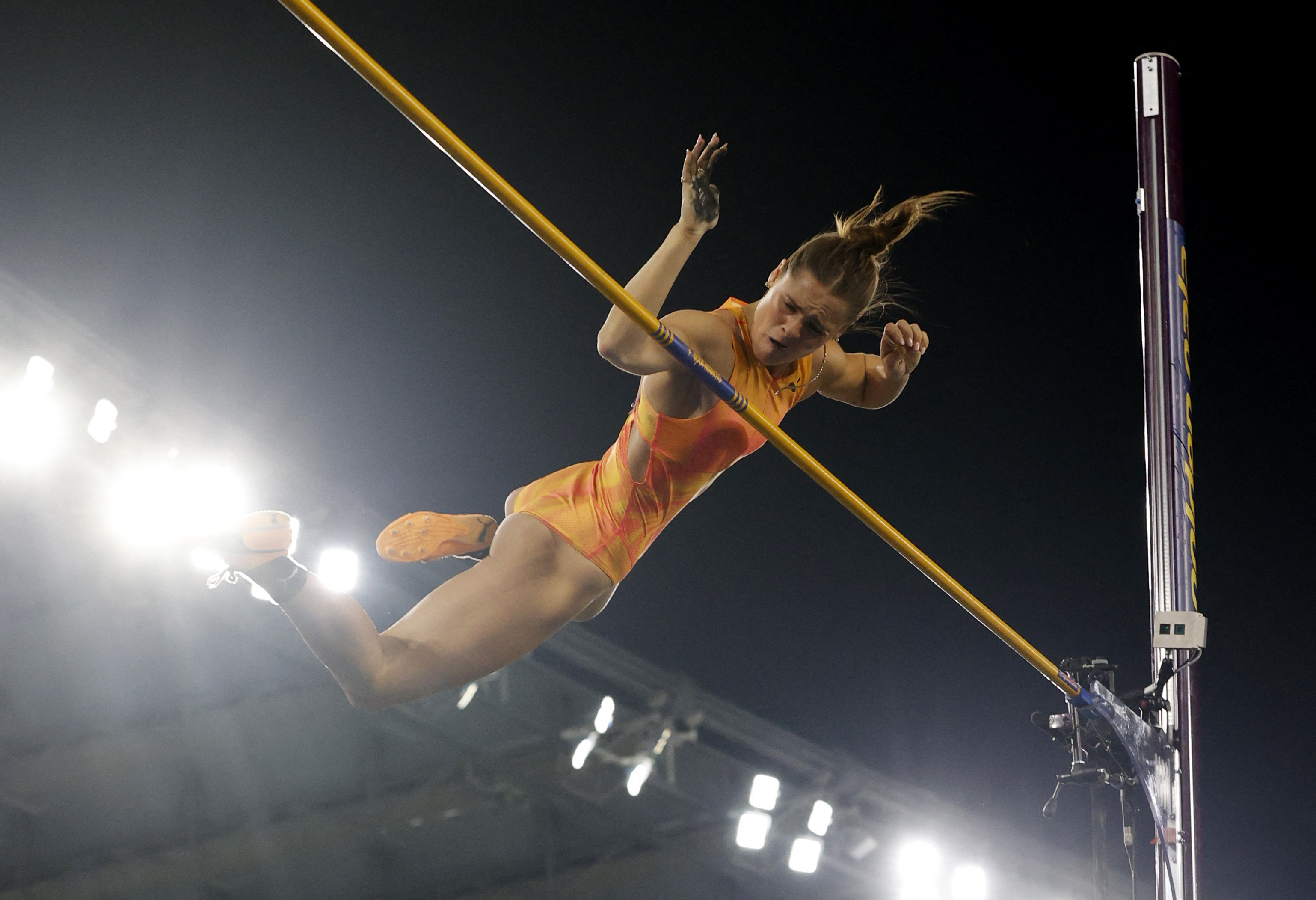 Mongrel' spirit drives pole vault queen Kennedy in world title