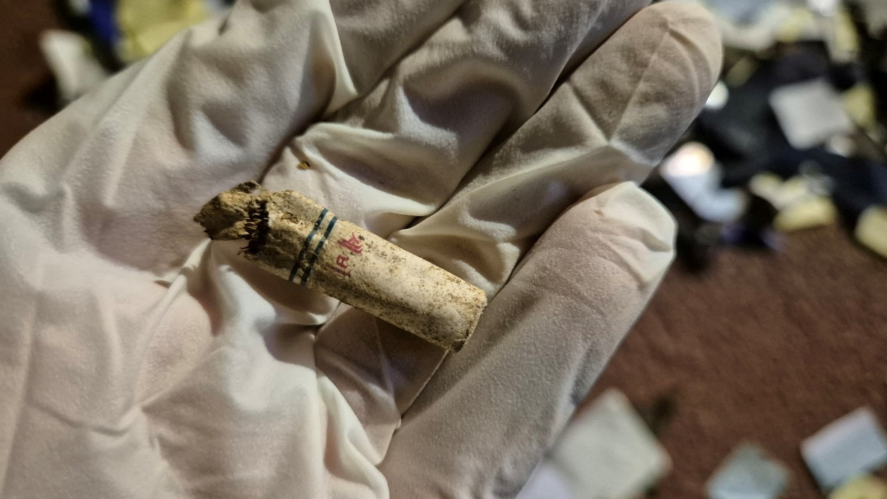 A cigarette butt found from a balloon believed to have been sent by North Korea, carrying various objects including what appeared to be trash, is pictured in Seoul