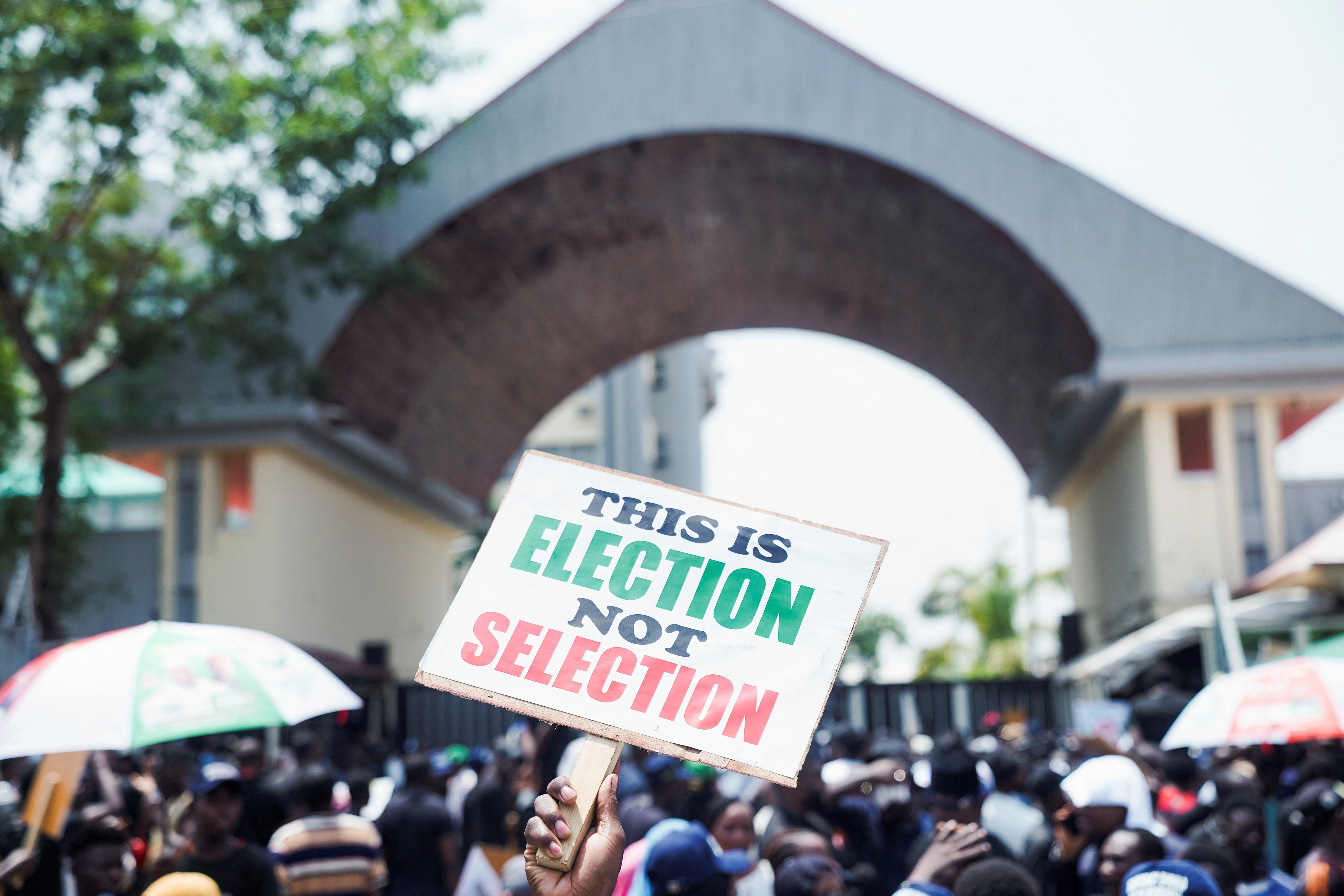 Supporters of the Peoples Democratic Party (PDP) protest at the national headquarters of the Independent National Electoral Commission (INEC)  to disapprove the outcome of the February 25 election result in Abuja