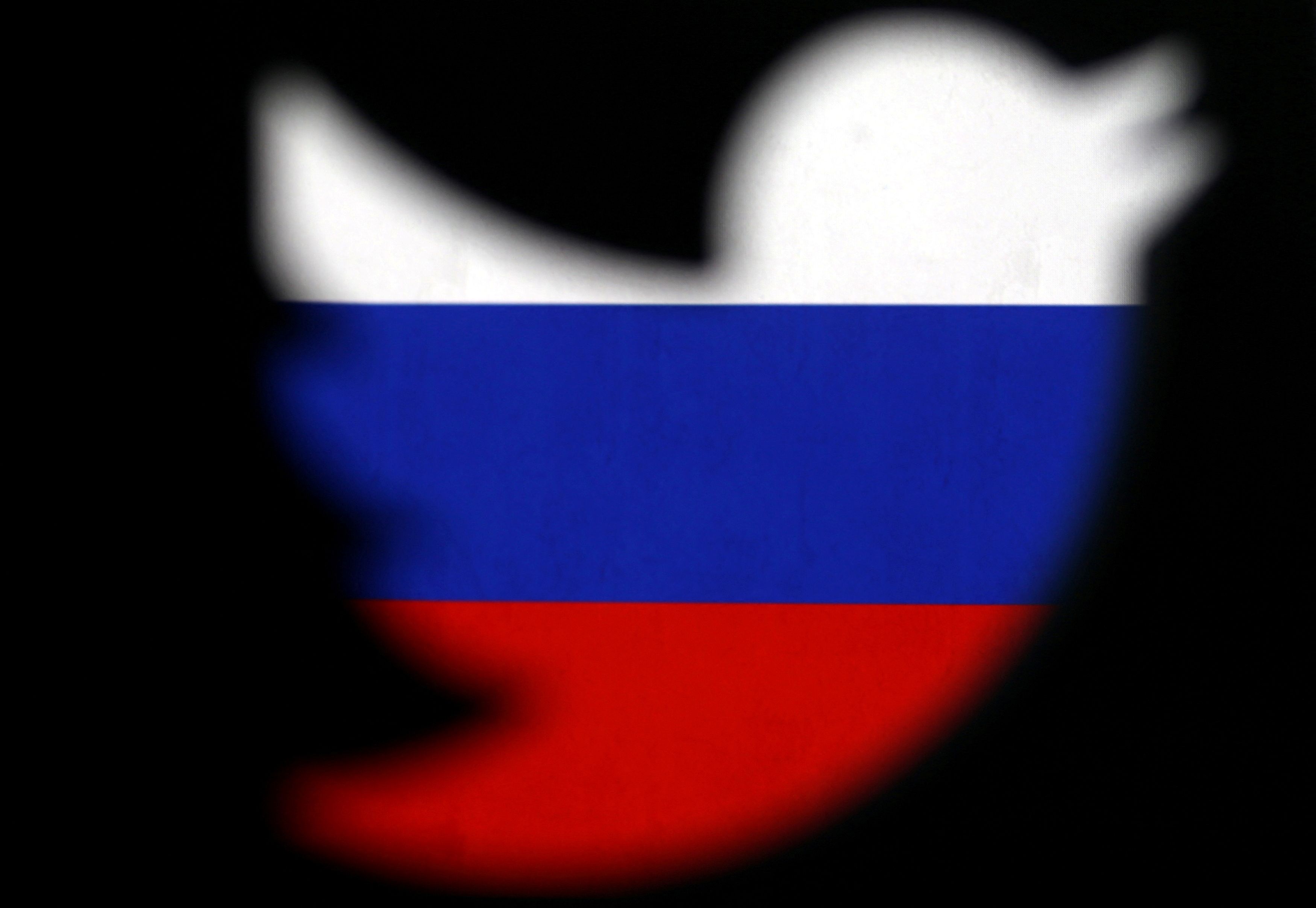 A 3D-printed Twitter logo displayed in front of Russian flag is seen in this illustration picture
