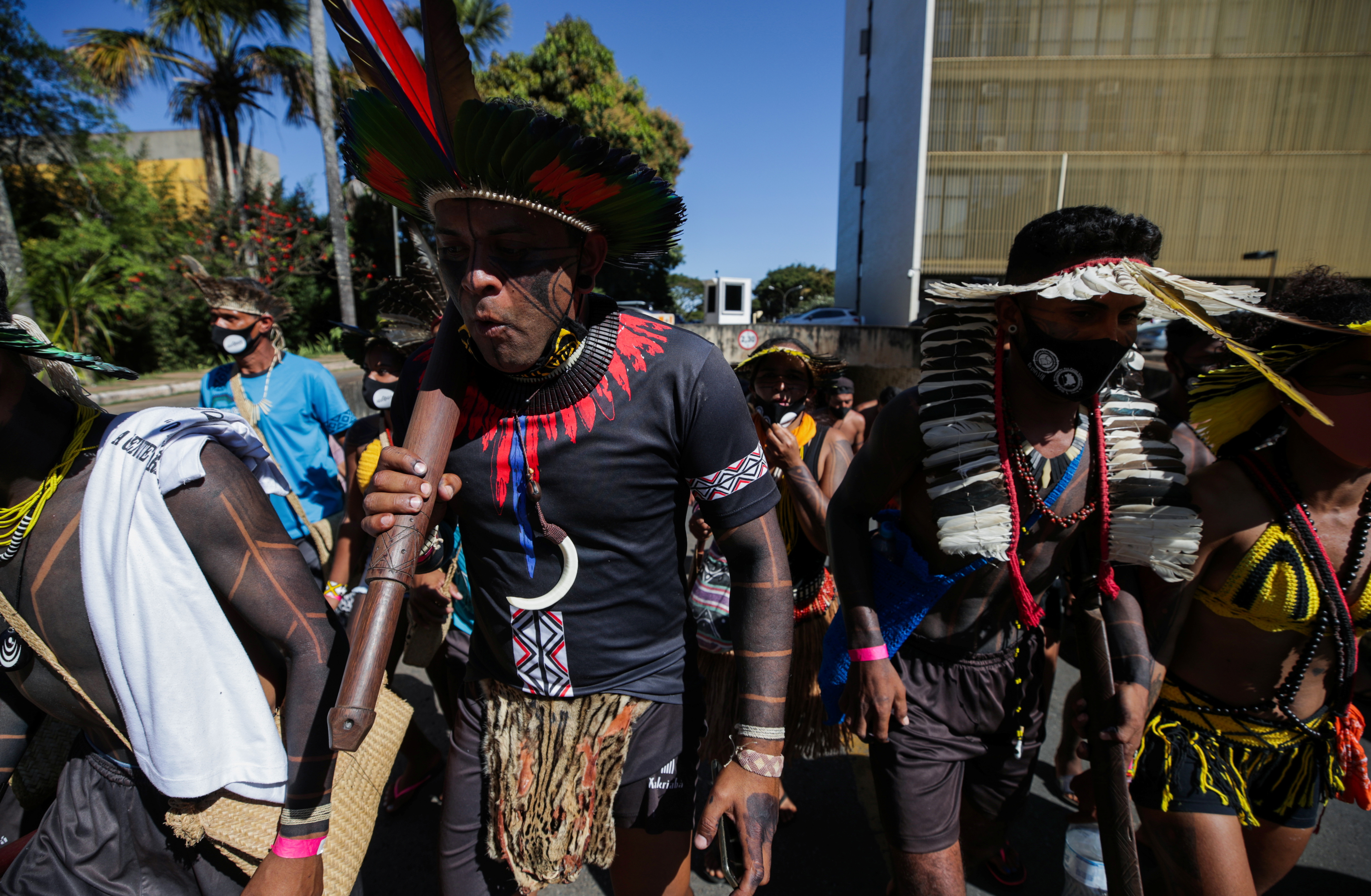 Indigenous Brazilians from different ethnic groups take part in a protest against land demarcation and President Jair Bolsonaro's government, in Brasilia