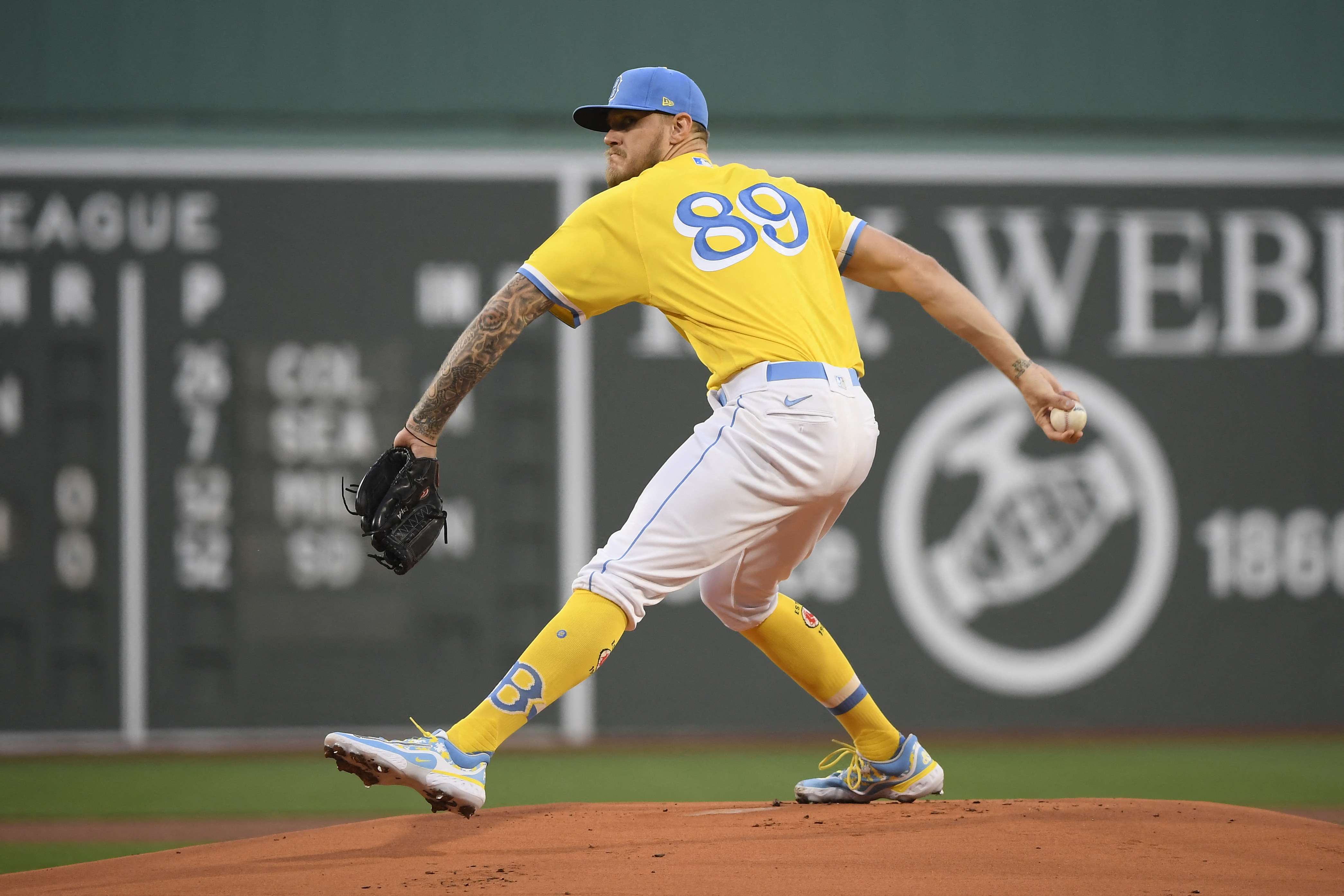 Why are the Boston Red Sox wearing yellow and blue uniforms today?