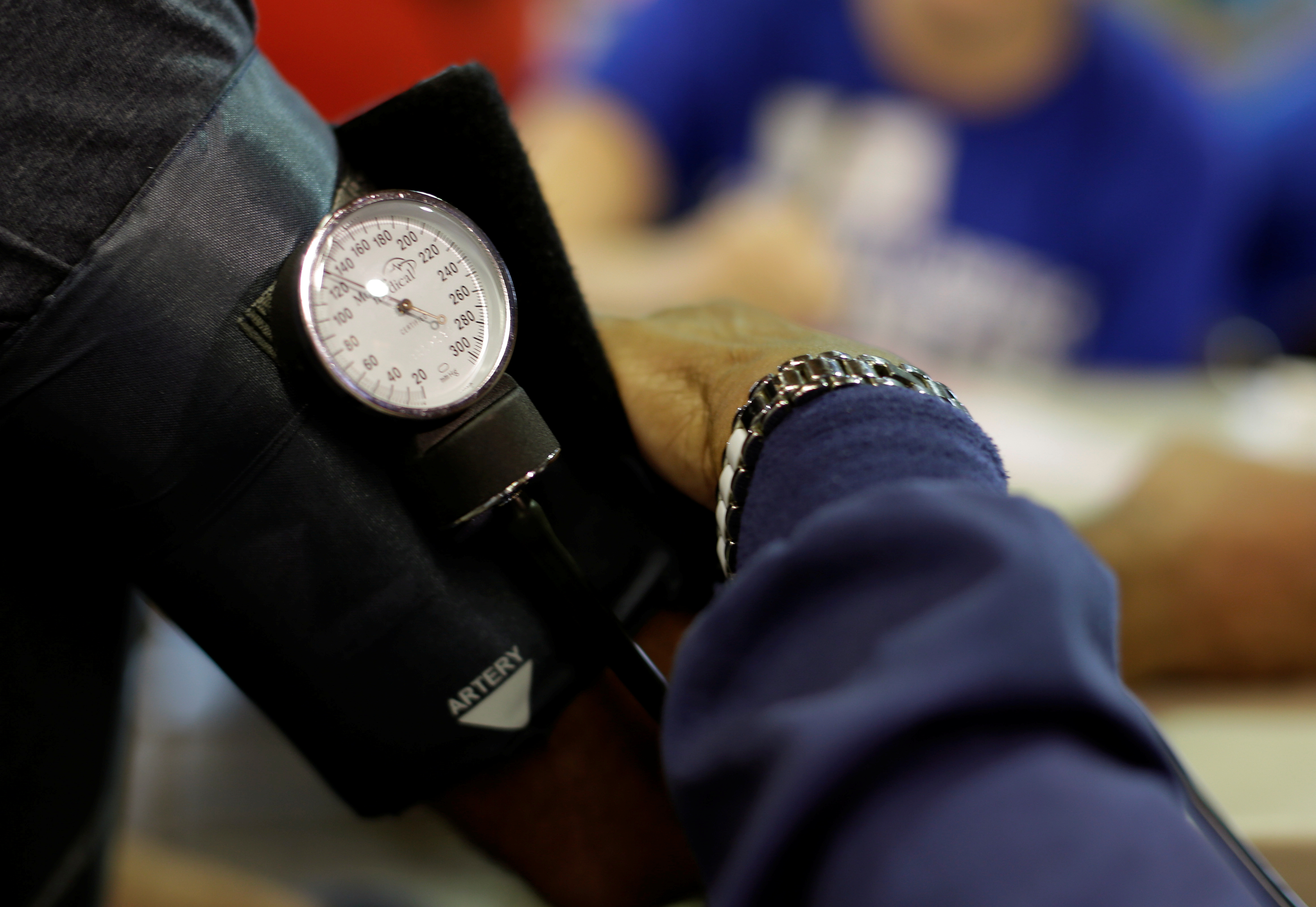 A man has his blood pressure checked at the Remote Area Medical Clinic in Wise, Virginia