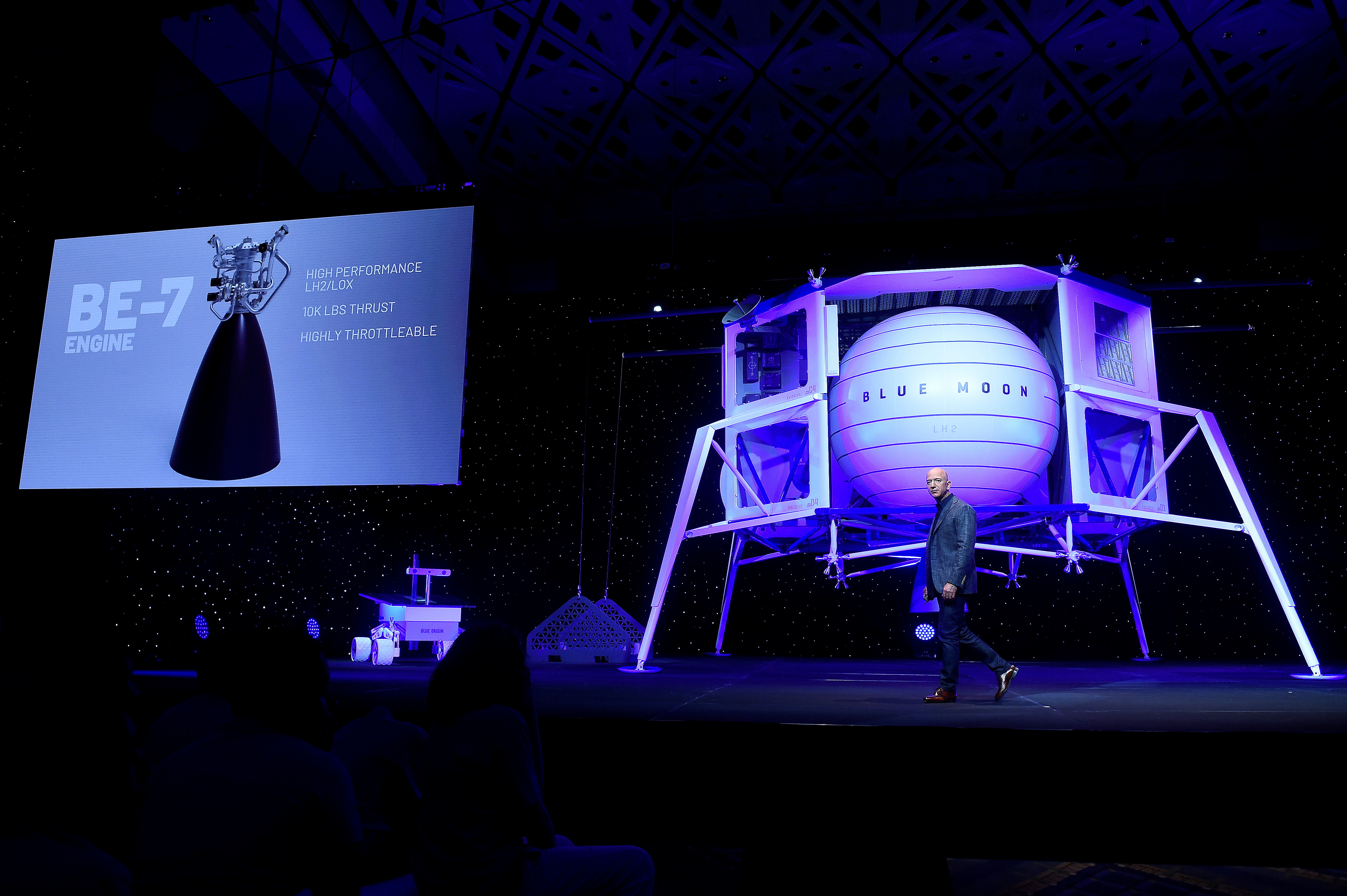 Founder, Chairman, CEO and President of Amazon Jeff Bezos unveils the BE-7 rocket engine that his space company Blue Origin's space exploration lunar lander rocket called Blue Moon will use during an unveiling event in Washington
