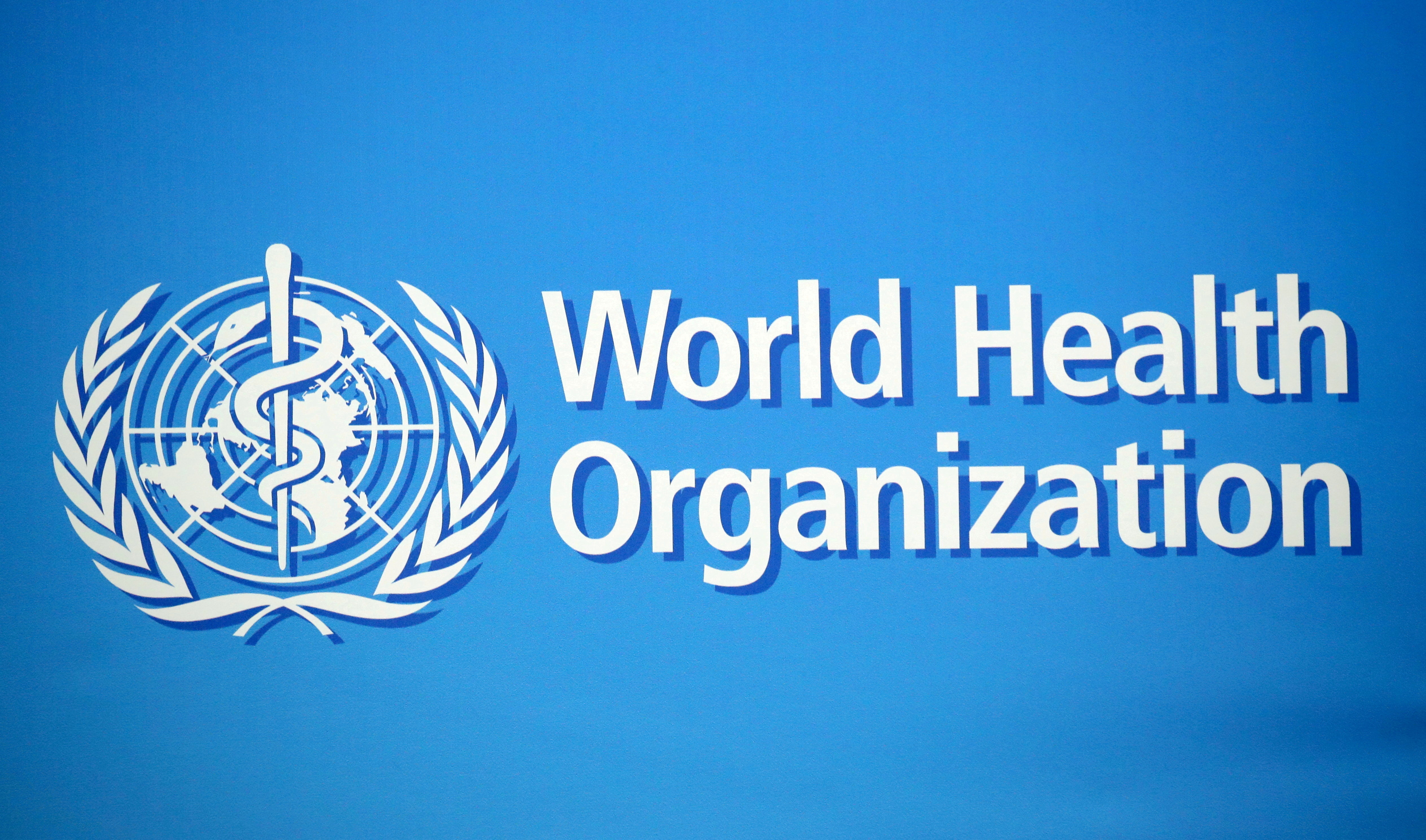 The WHO logo is pictured at the WHO building in Geneva