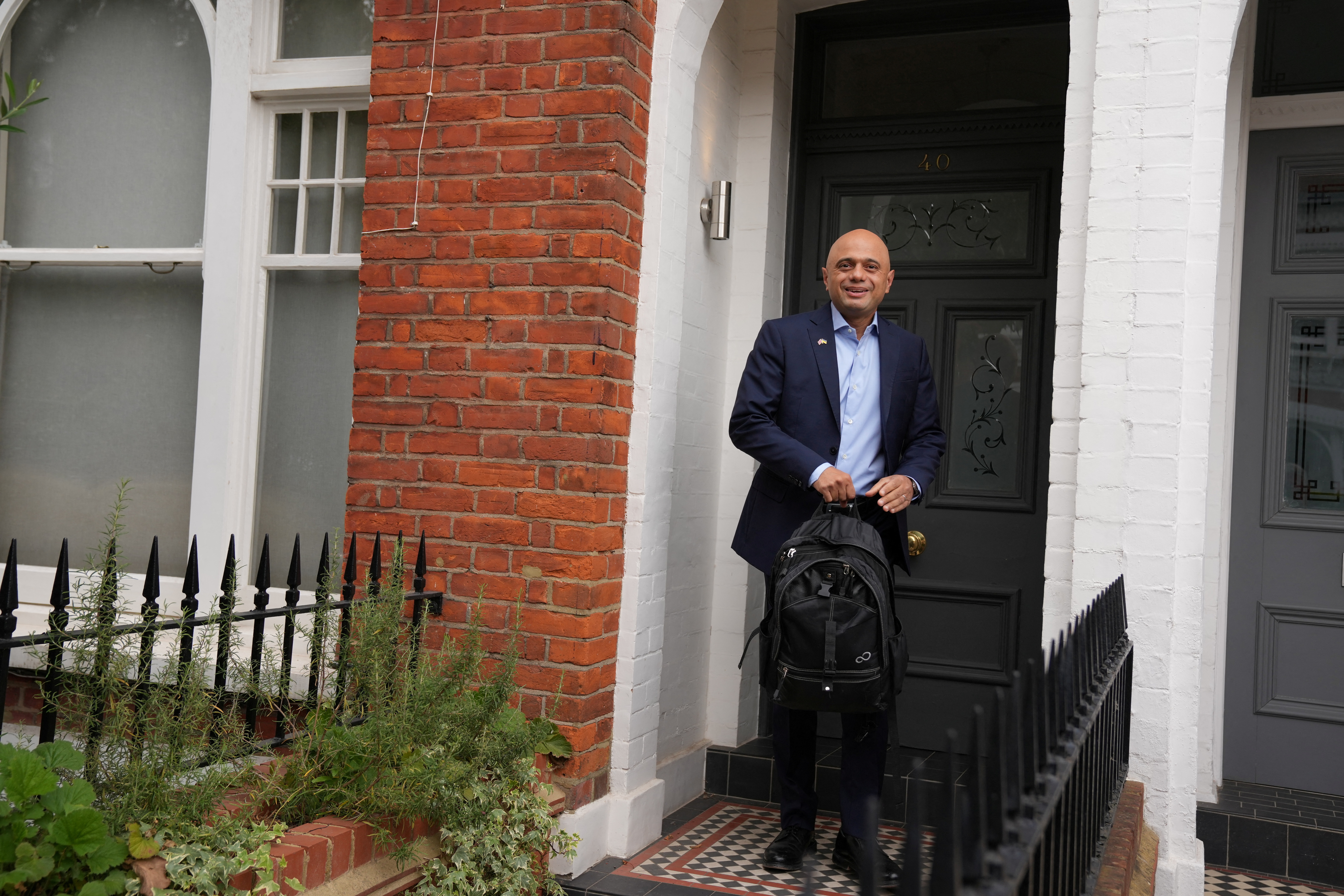 Former British Health Secretary Sajid Javid leaves his home in London