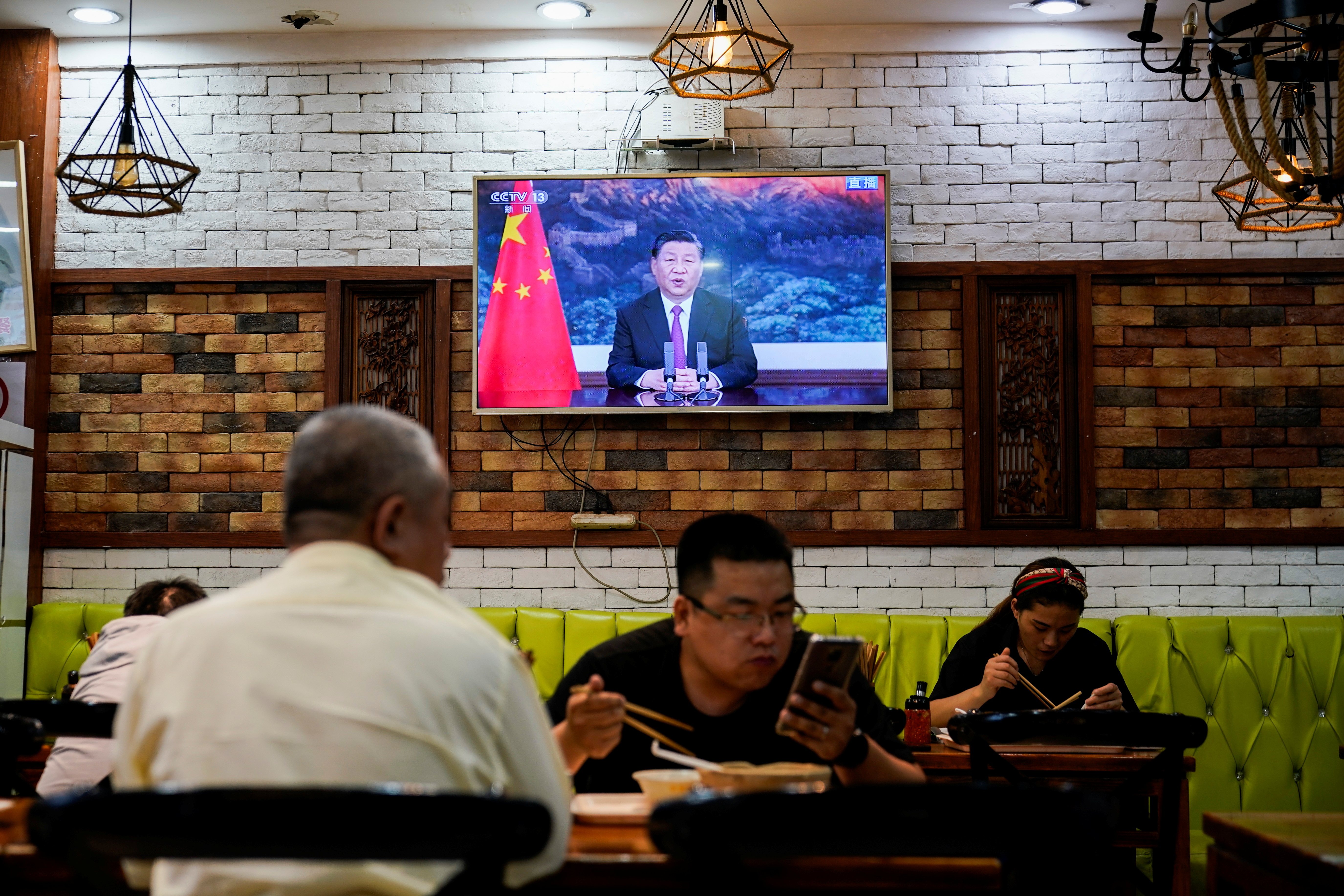 Chinese President Xi Jinping speaks via video link at the opening ceremony of the 2021 China International Fair for Trade in Services (CIFTIS), in Shanghai