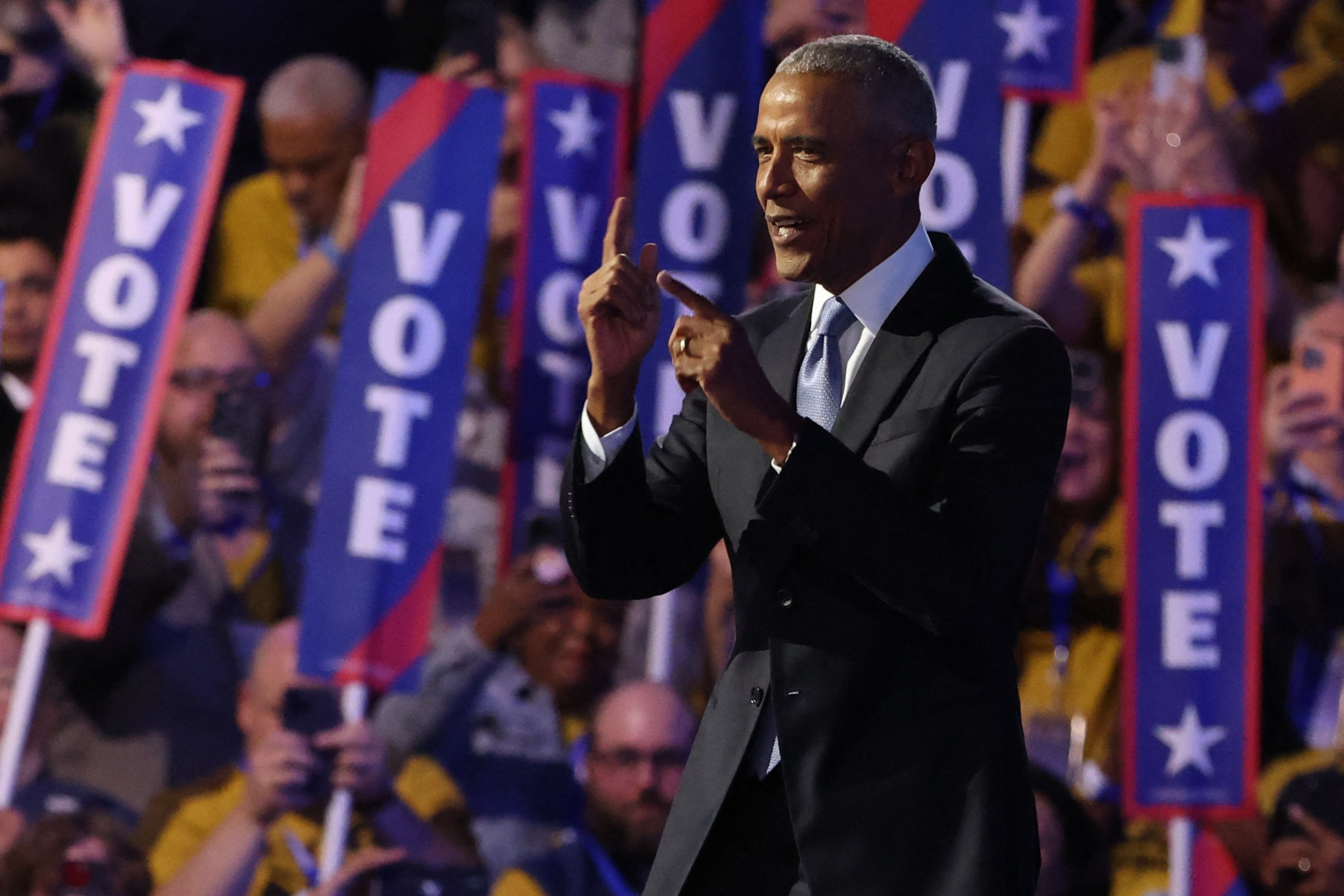 Obama night at the DNC: Barack, Michelle rouse crowd for Harris | Reuters