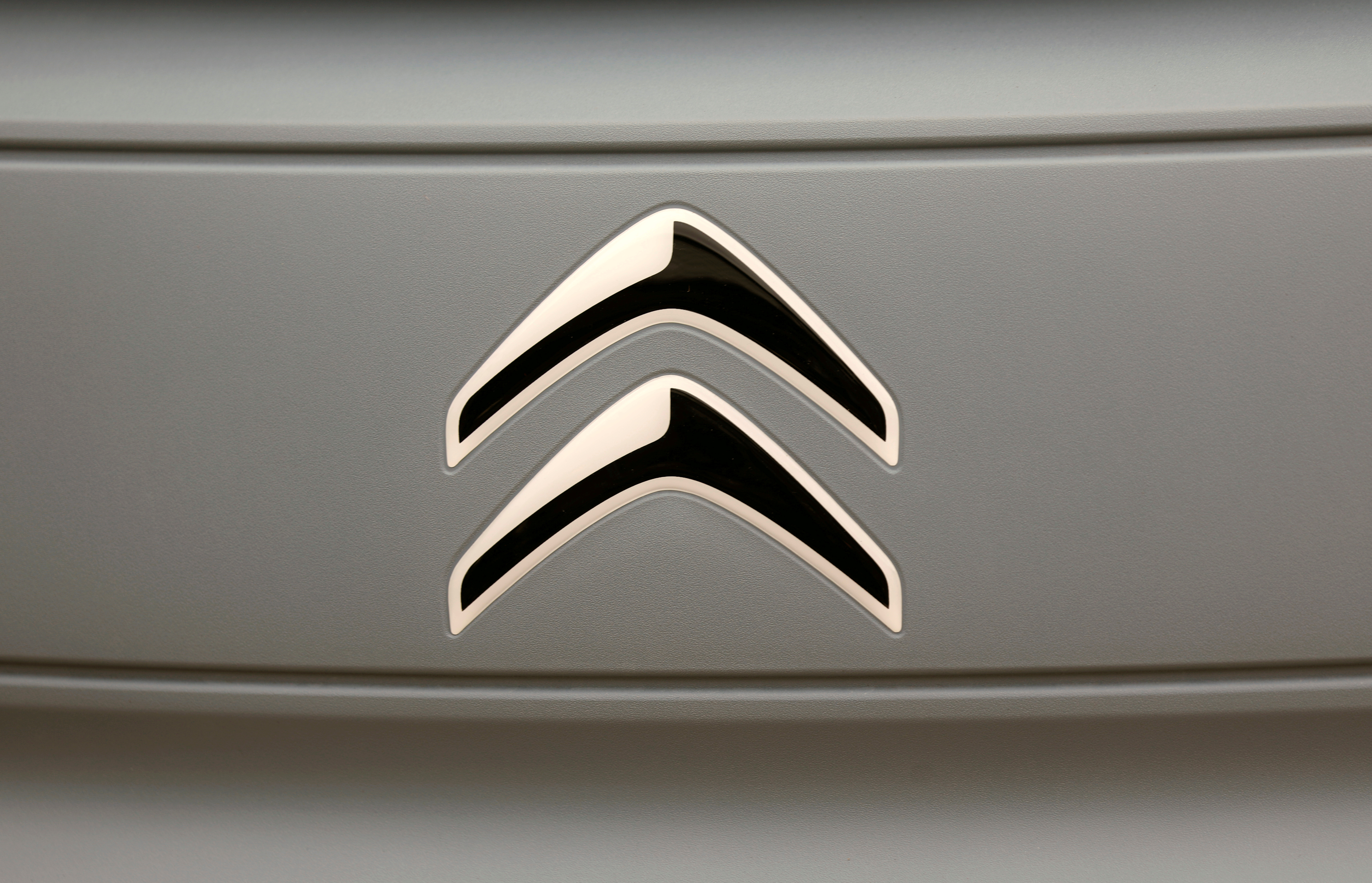 The logo of Citroen is seen on a new electric car AMI during a media presentation in Paris