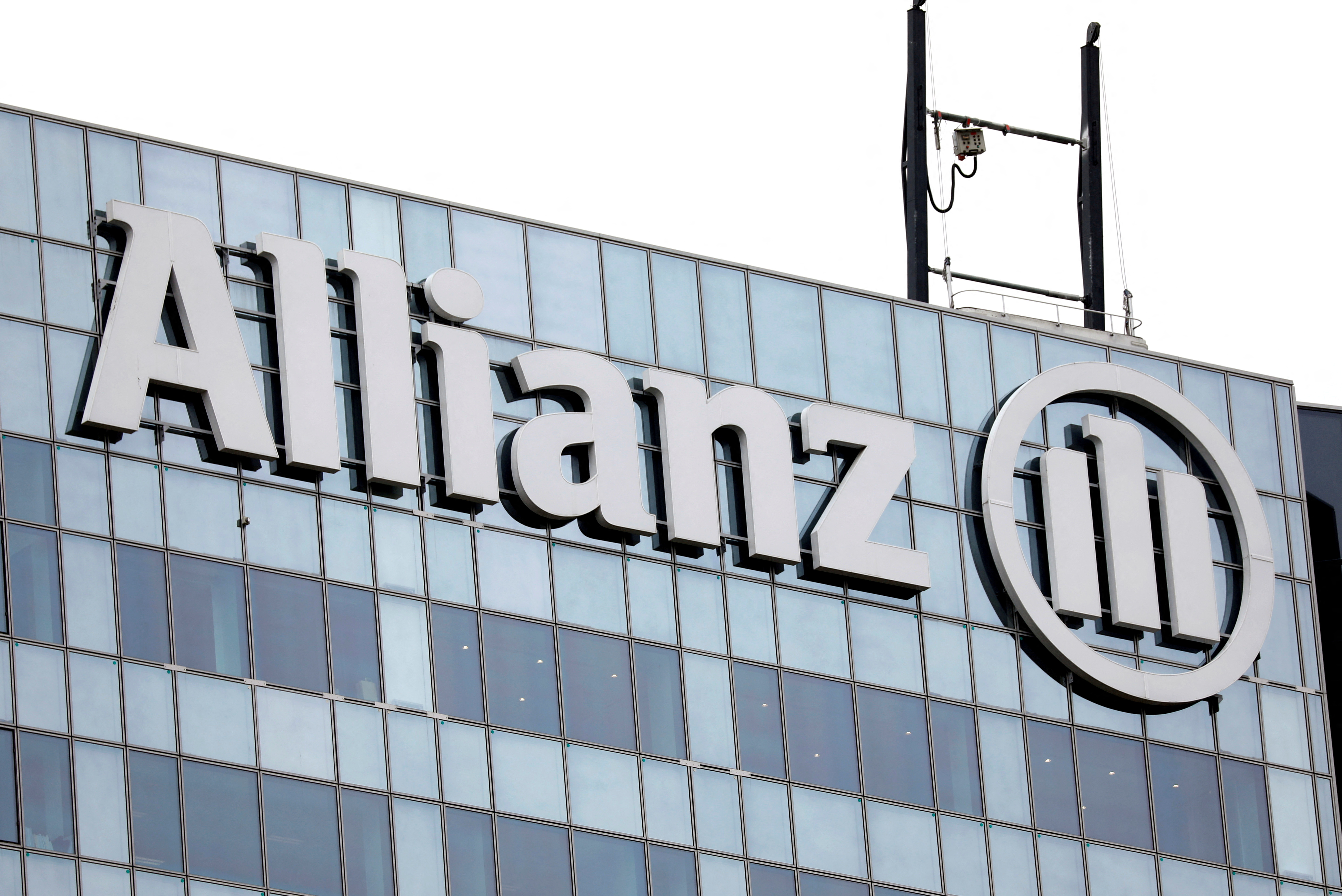 The logo of insurer Allianz SE is seen on the company building in Puteaux at the financial and business district of La Defense near Paris