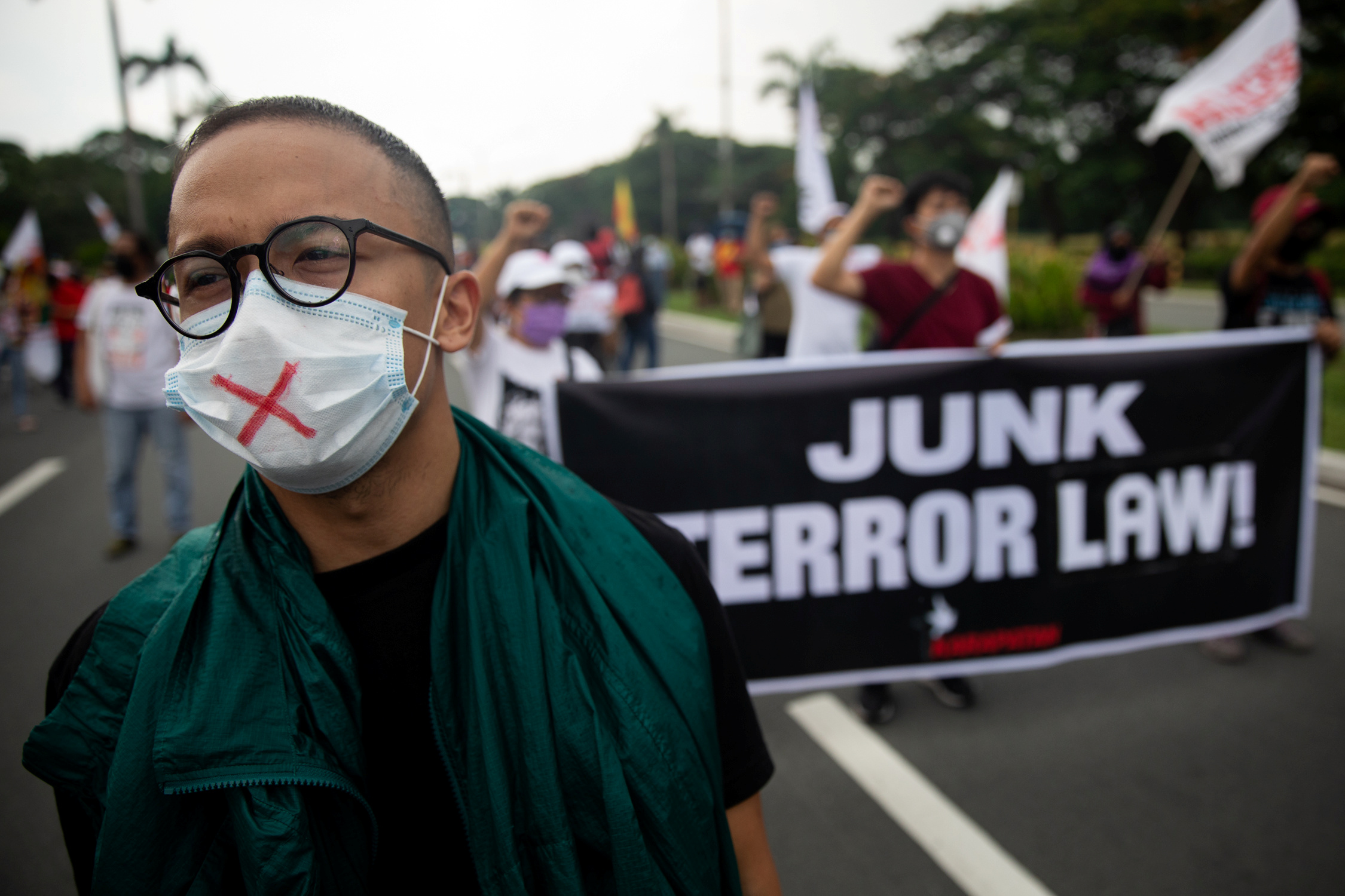 Filipinos protest after President Rodrigo Duterte approved anti-terror bill