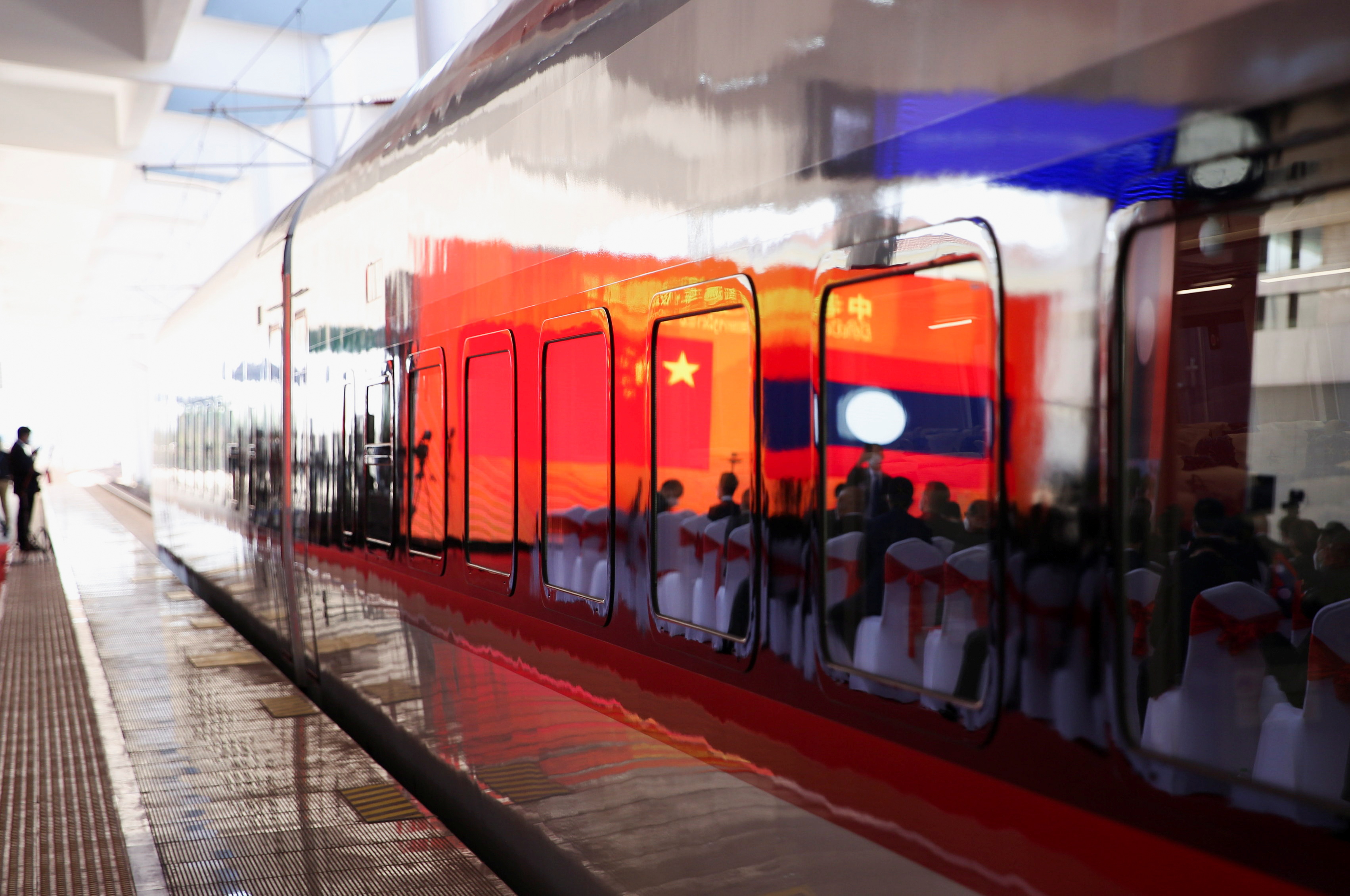 China and Laos open $6 billion high-speed rail link | Reuters