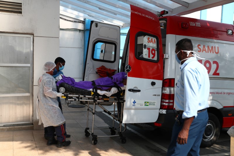A patient with suspected COVID-19 infection arrives at the Sao Jose hospital in the Emergency Mobile Care Service (SAMU) ambulance, amid the coronavirus disease (COVID-19) outbreak, in Duque de Caxias near Rio de Janeiro, Brazil May 20, 2021. REUTERS/Pilar Olivares