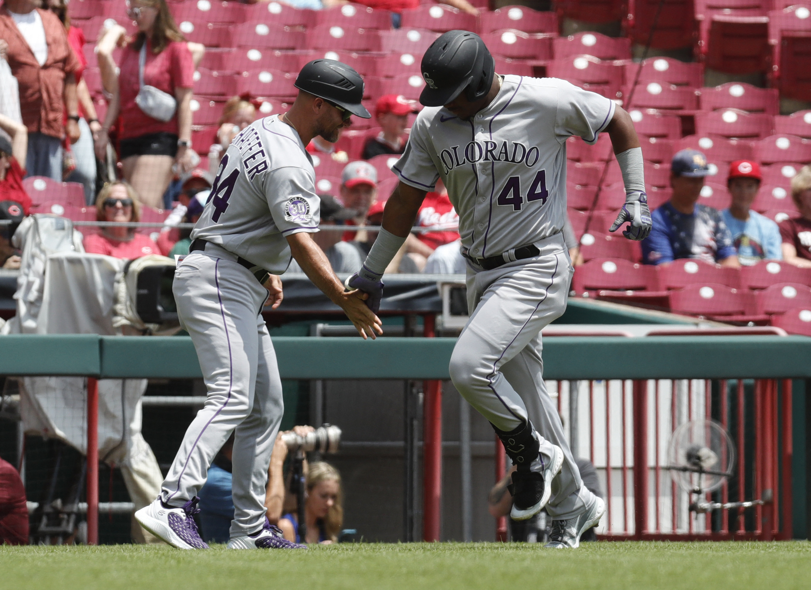 Reds beat Rockies, stretch winning streak to 11