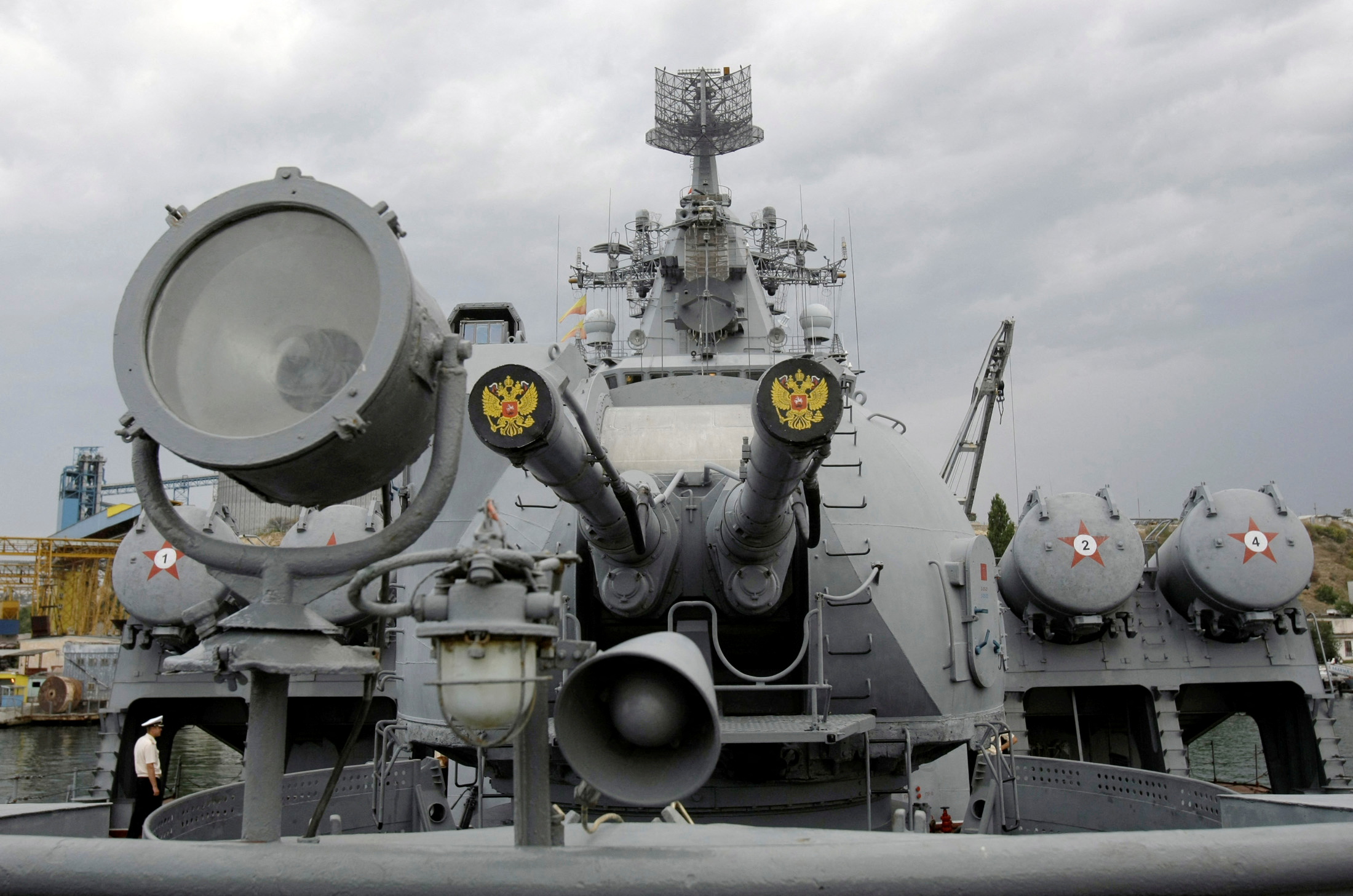 Russia's coat of arms, the double headed eagle, is seen on covers of the missile cruiser Moskva in the Ukrainian Black Sea port of Sevastopol
