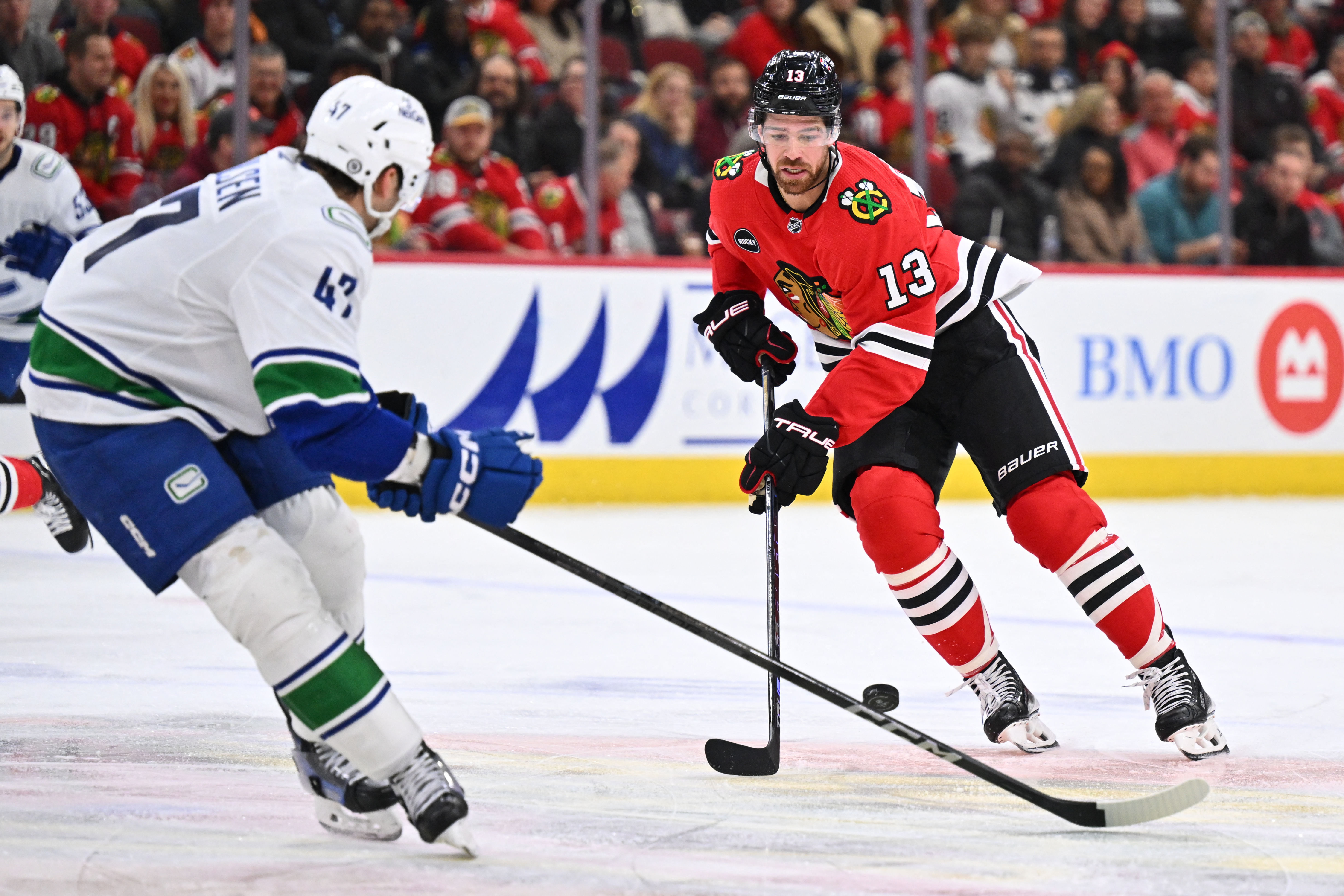 In battle of NHL's first and last, Canucks best Blackhawks - The Rink Live