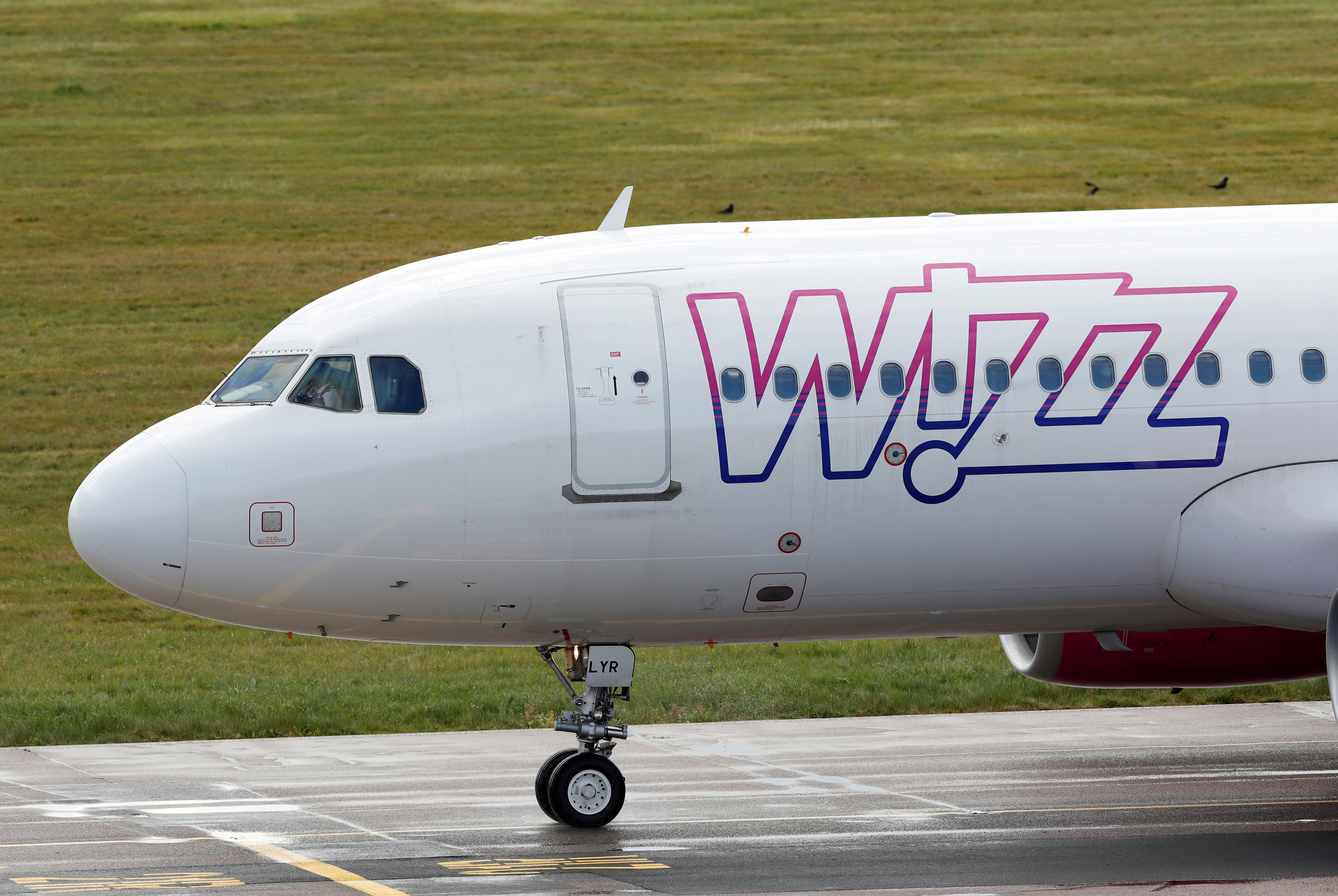 A Wizz Air Airbus A320 at Luton Airport,  Luton, Britain, May 1, 2020. REUTERS/Andrew Boyers