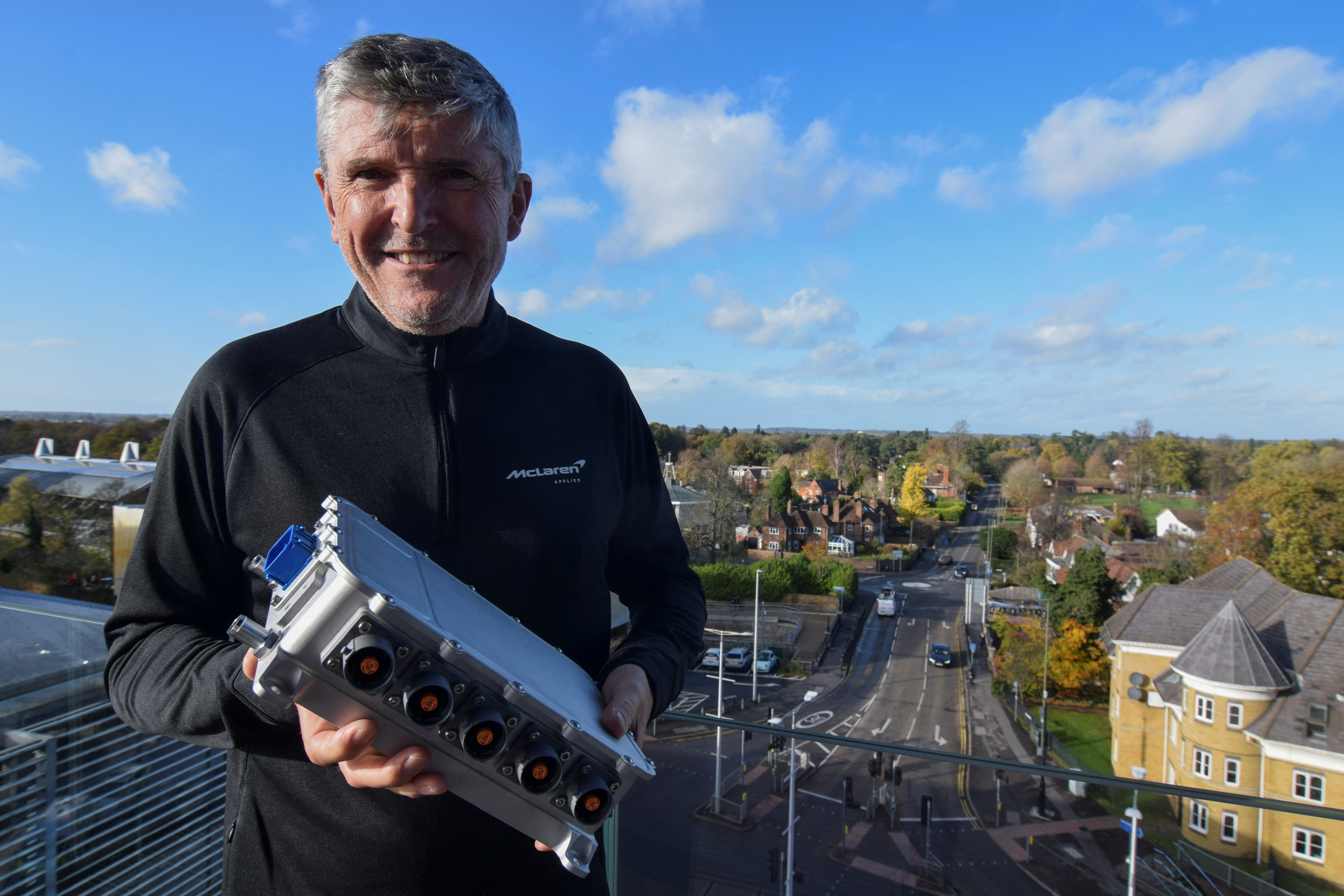Nick Fry, chief executive of McLaren Applied, holds the IPG5 inverter the Formula One engineering and technology firm has developed in Woking