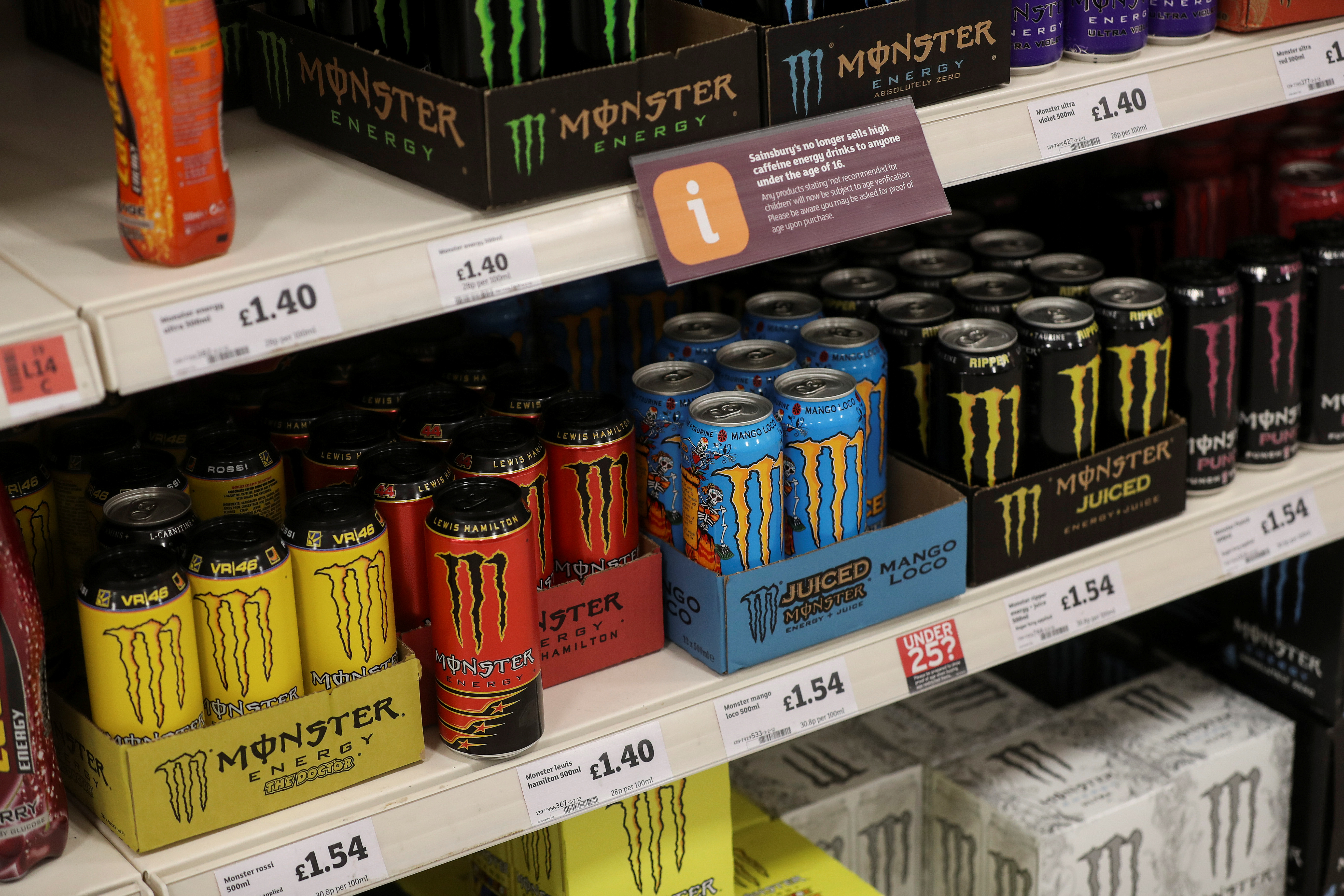 Monster energy drinks sit on display at a Sainsbury's store in London