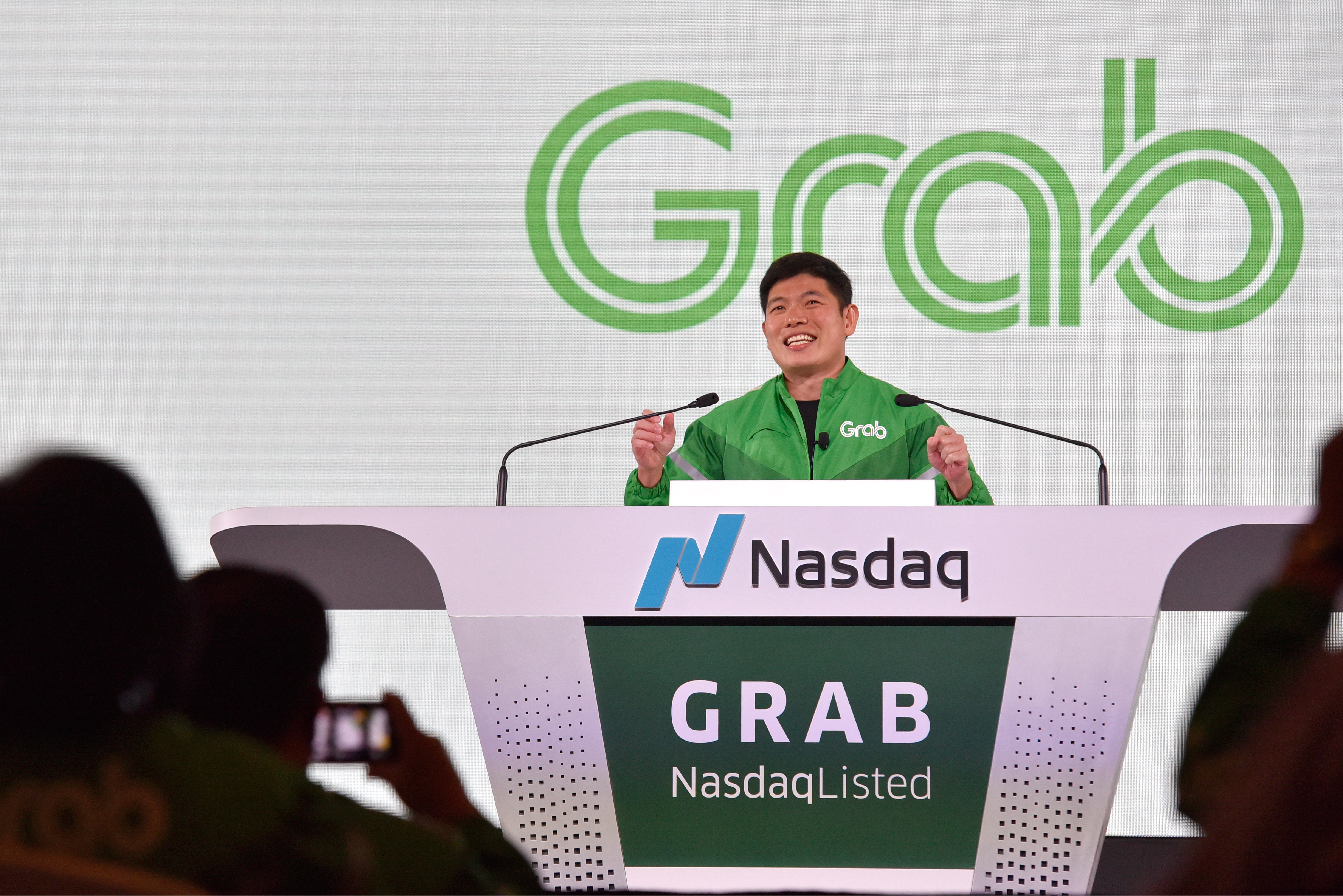 Grab's CEO Anthony Tan gives a speech before the Grab Bell Ringing Ceremony at a hotel in Singapore
