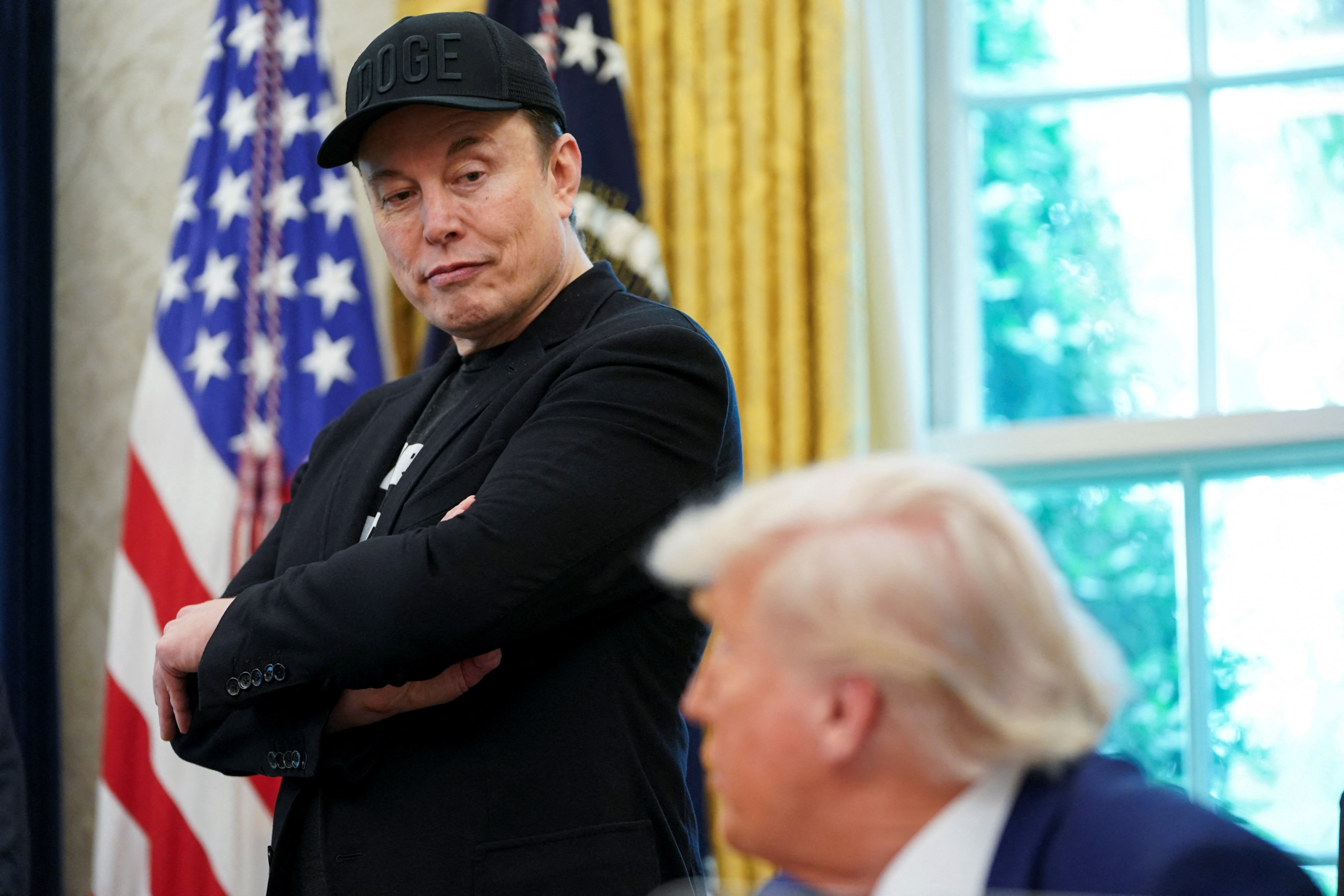 Trump, Musk feud explodes with threats of cutting contracts, backing  impeachment | Reuters