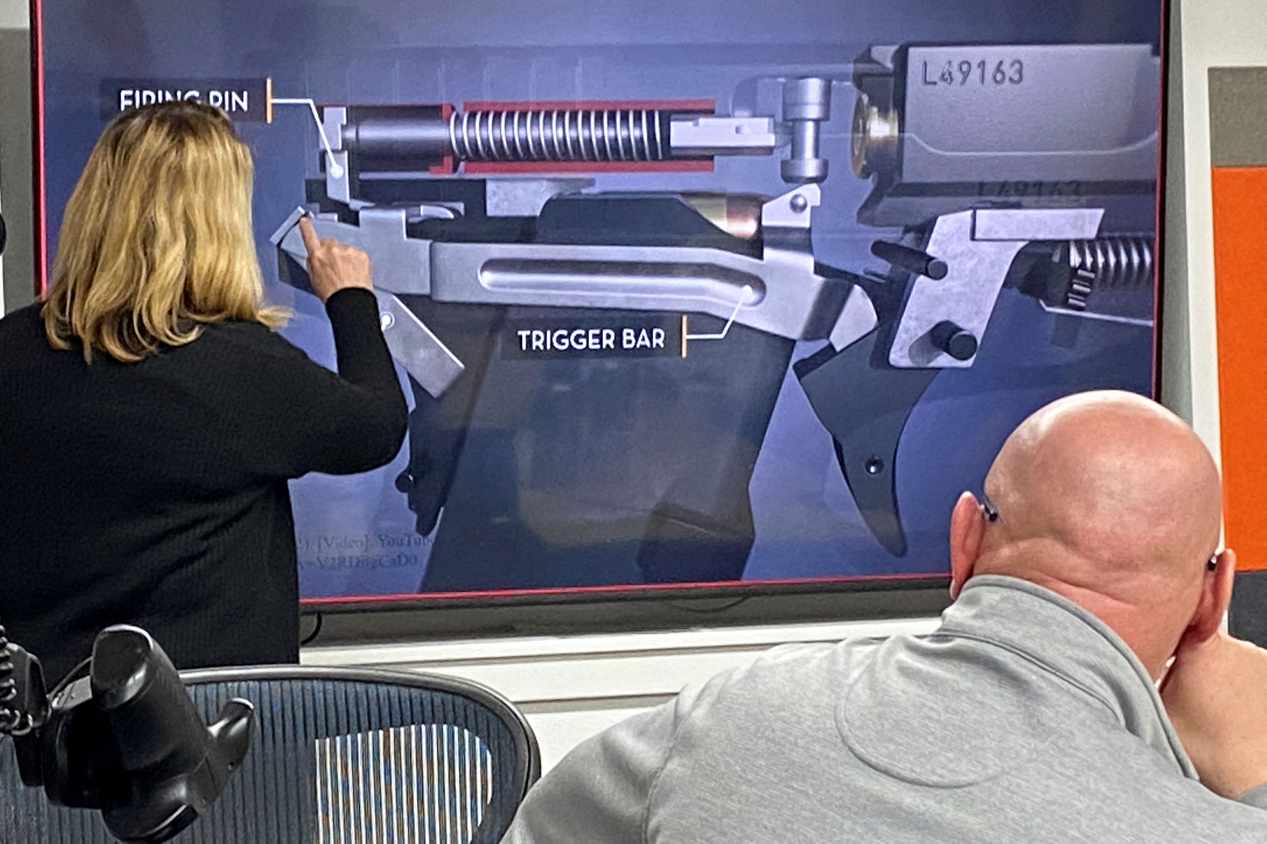 Ginger Chandler, LodeStar Works SVP and Chief Technical Officer, makes presentation on the breakdown of their smart gun, which works only for the designated user, during a presentation for shareholders and potential investors in Boise, Idaho, U.S. January 7, 2022.  REUTERS/Brian Losness
