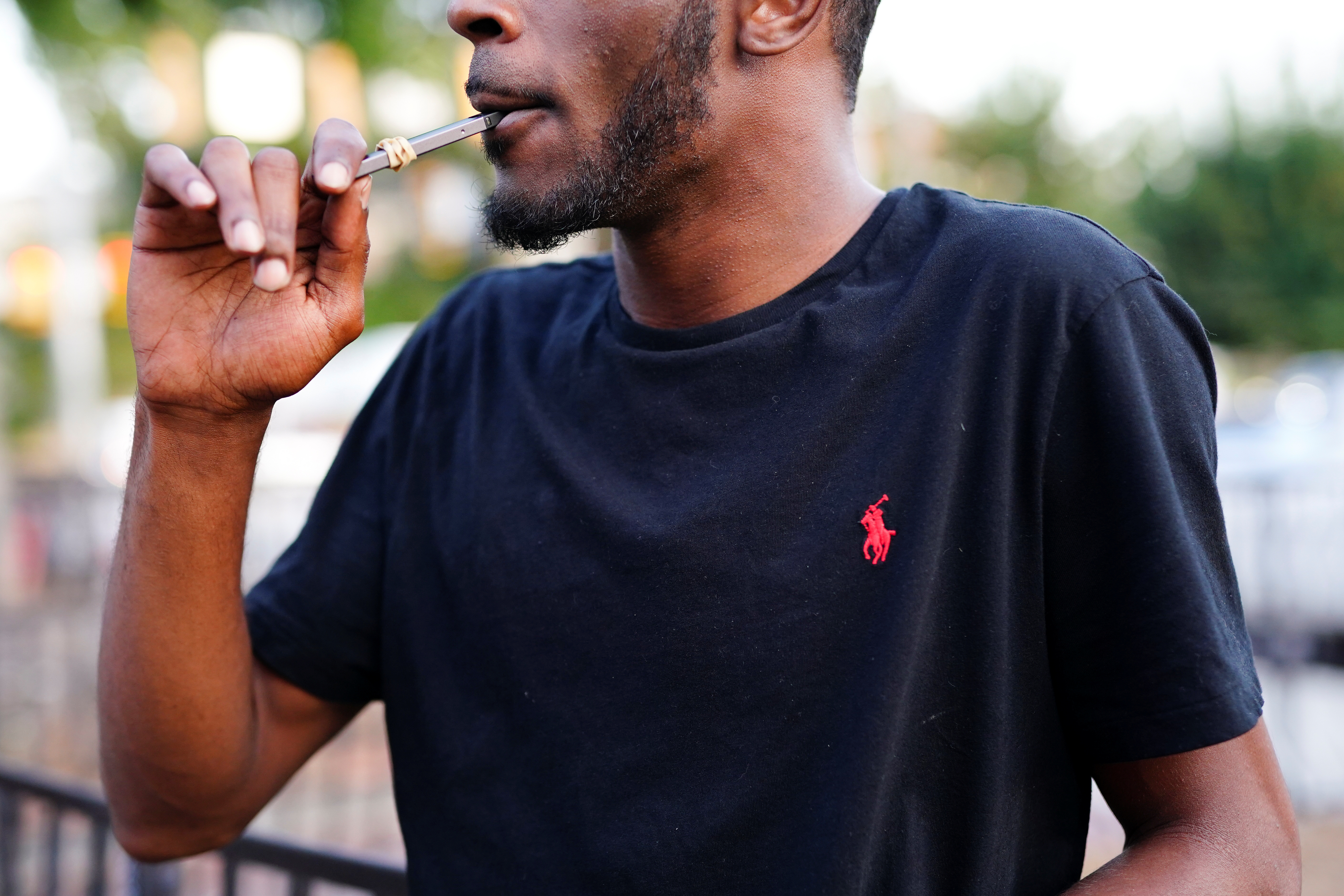 A man uses a Juul vaporizer in Atlanta