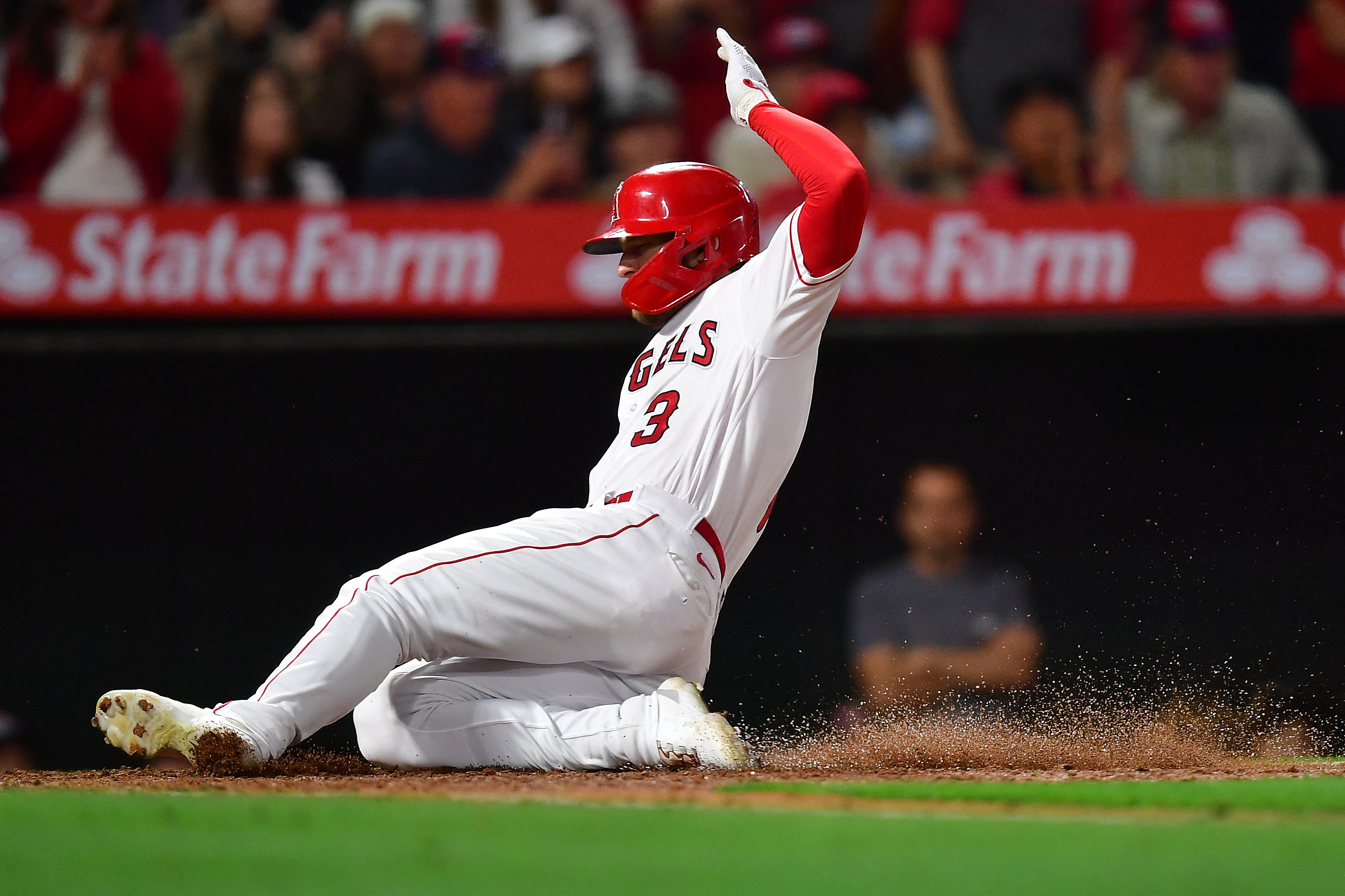 ANAHEIM, CA - MAY 19: Los Angeles Angels center fielder Mickey Moniak (16)  running towards first base during an MLB baseball game against the  Minnesota Twins played on May 19, 2023 at