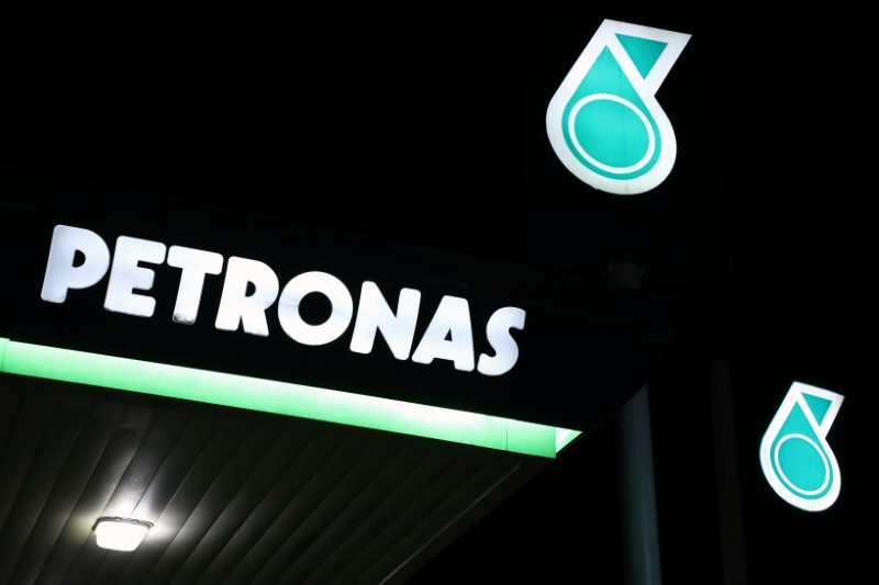Petronas logos are pictured at a fuel station in Kuala Lumpur