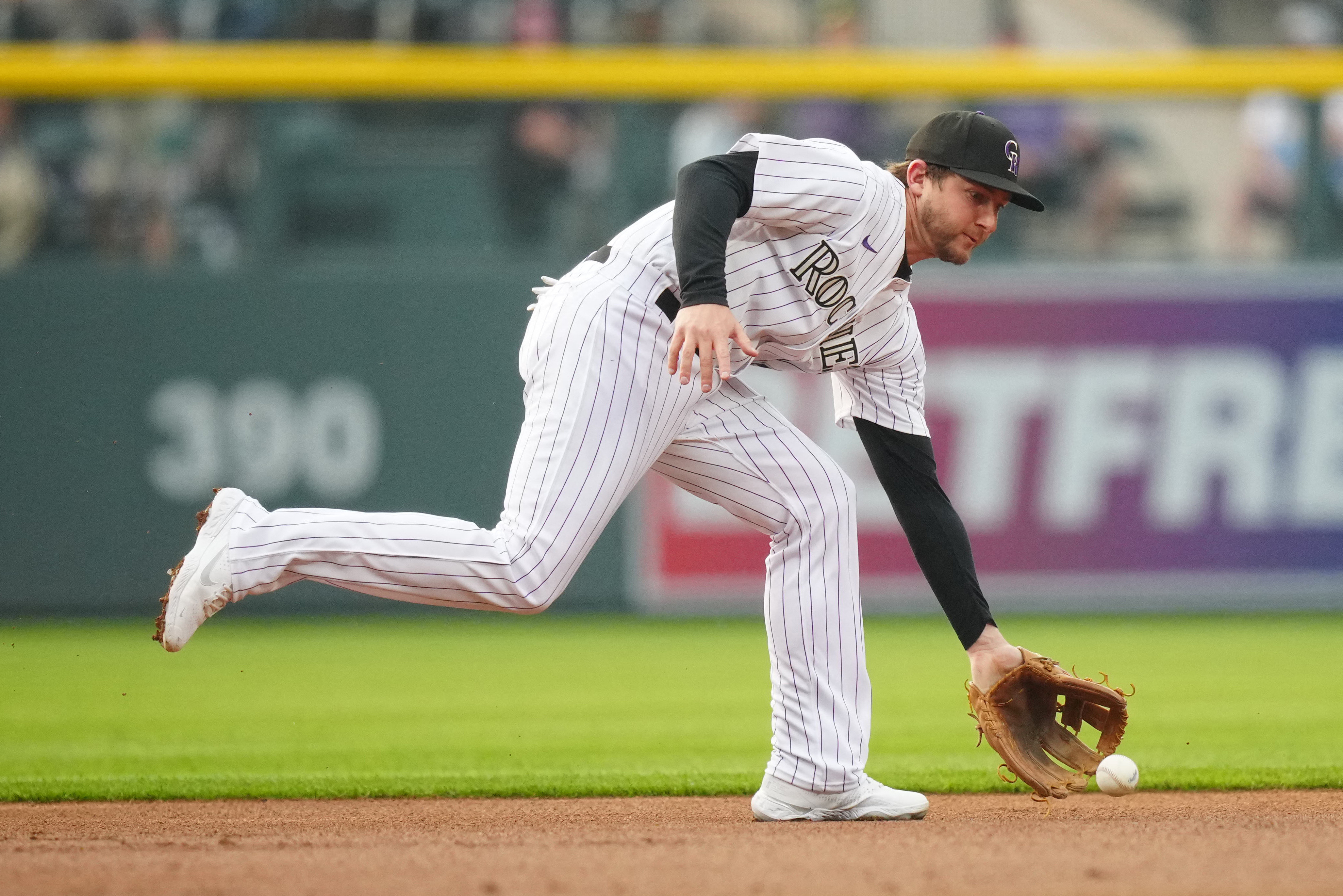 Rockies rebuff Marlins in ninth