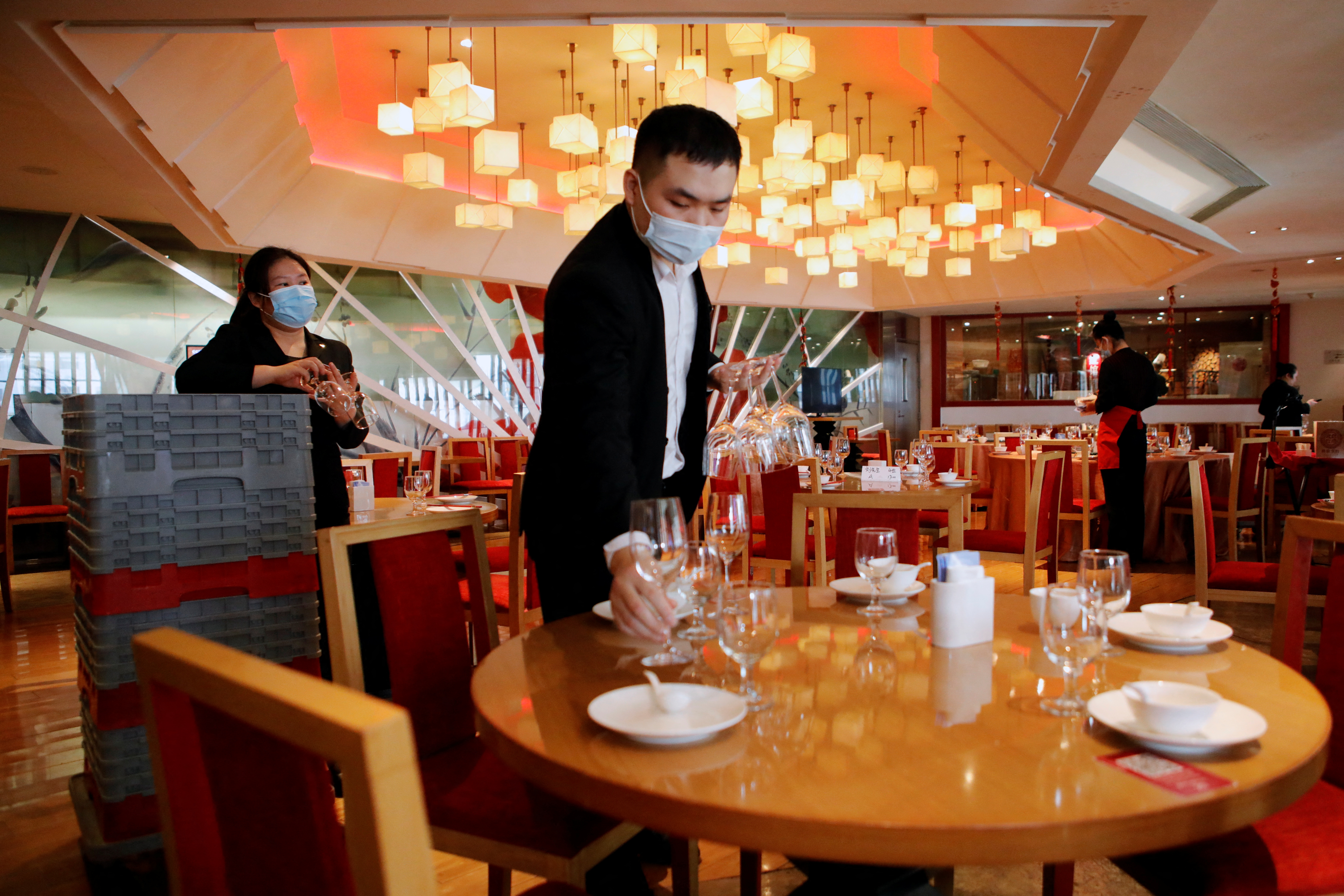 Lunar New Year's Eve dinner service at The Red Chamber restaurant in Beijing