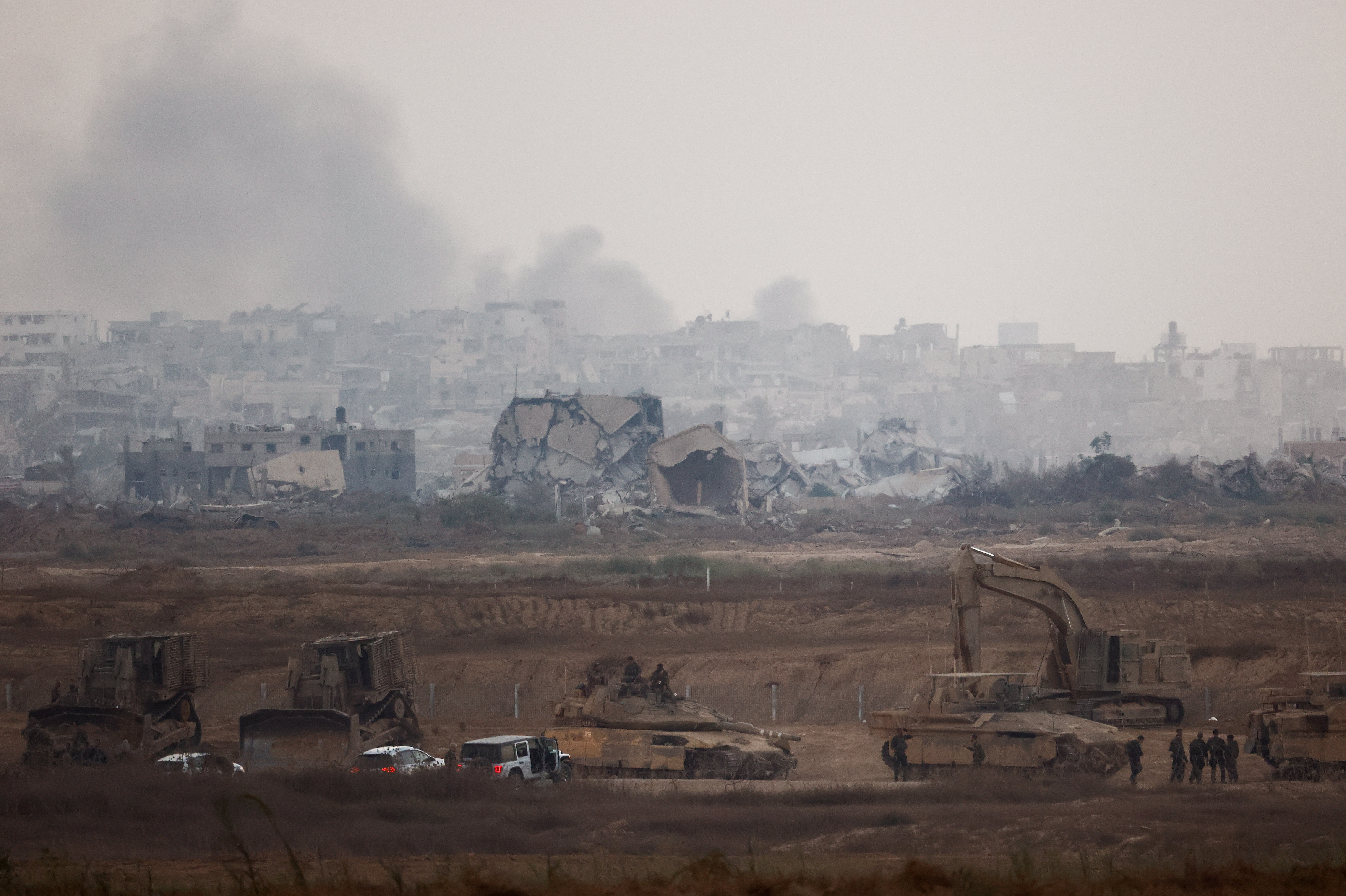 Israeli military troops prepare near the Israel-Gaza border