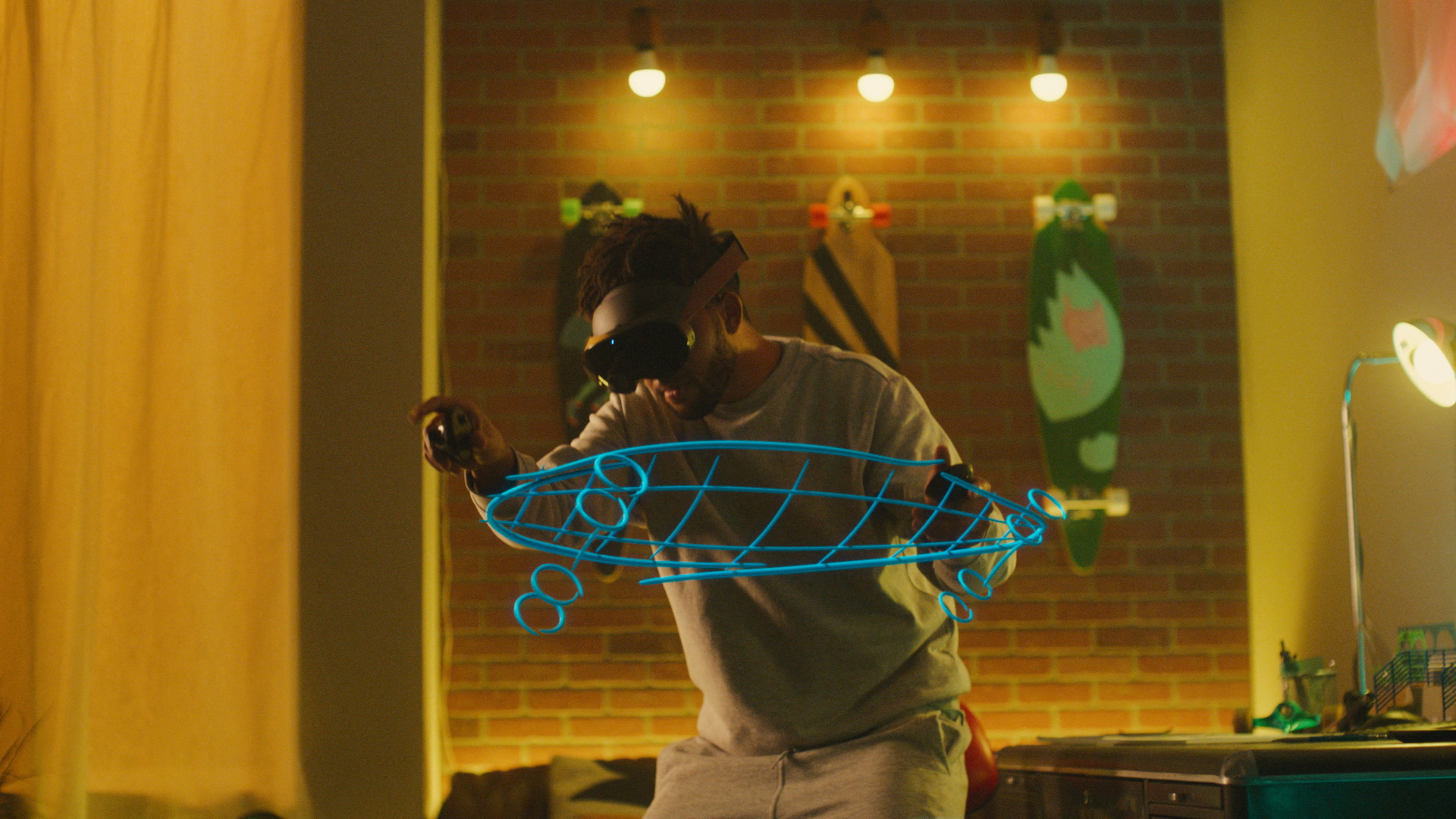 A man wearing a Meta Quest Pro interacts in mixed reality with a 3D virtual drawing of a skateboard