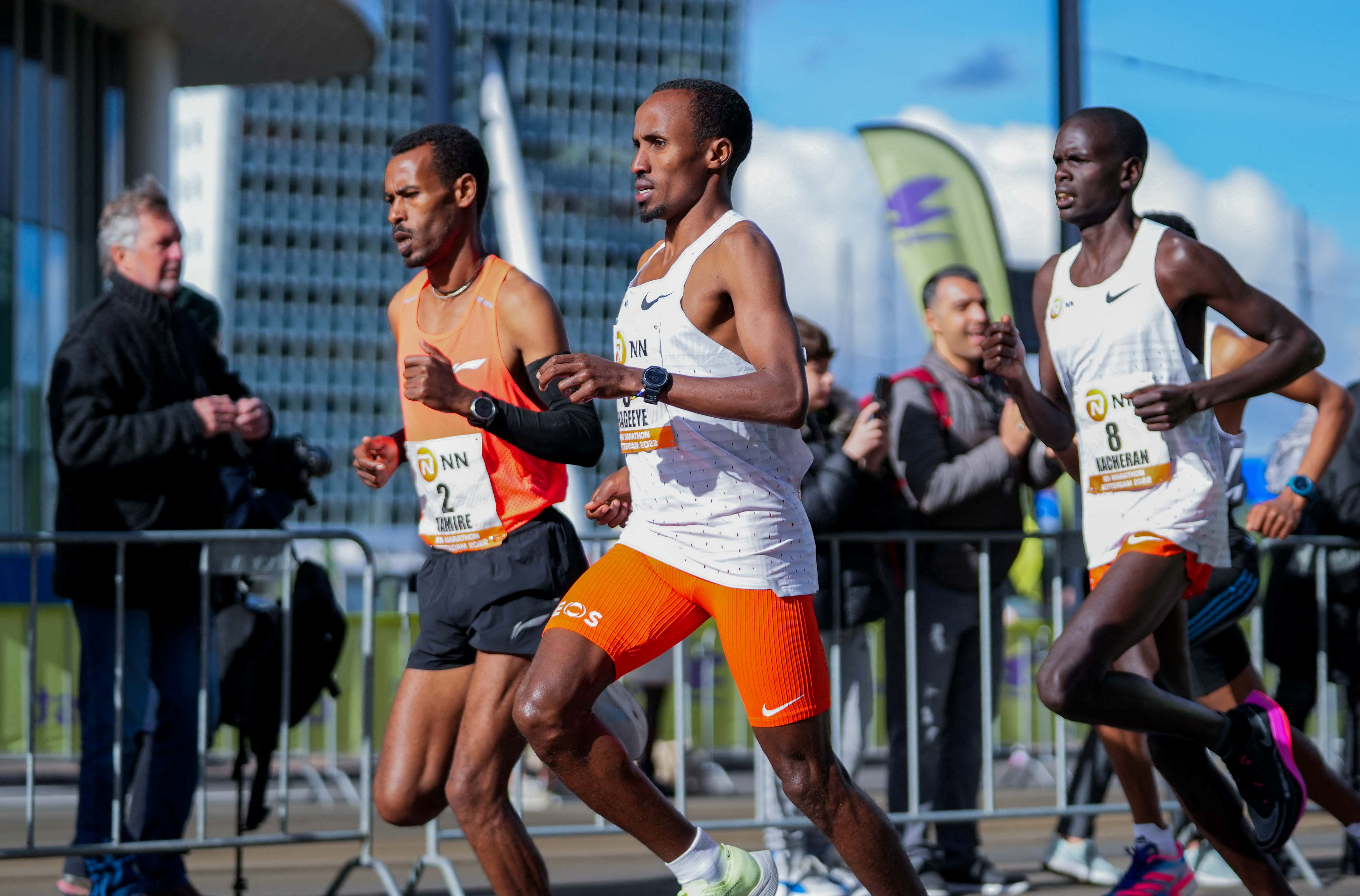 Dutch runner Abdi Nageeye wears a CGM (continuous glucose monitor) on his upper left arm as he competes in the 2022 Rotterdam marathon, in Rotterdam