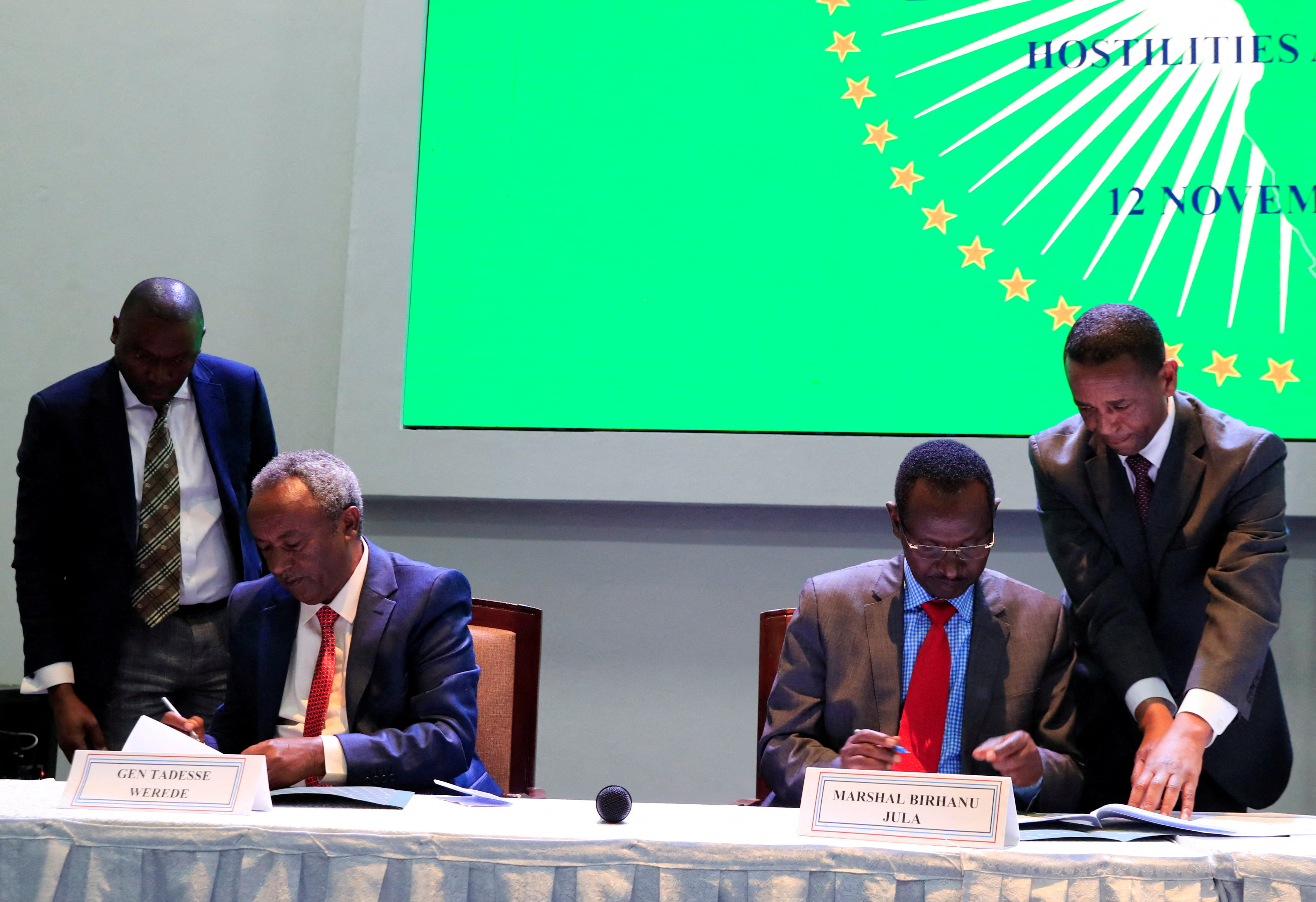 Field Marshal of the Ethiopian National Defence Force Birhanu Jula and Tadesse Werede Tesfay of the Tigray forces sign the implementation of the cessation of hostilities in Nairobi