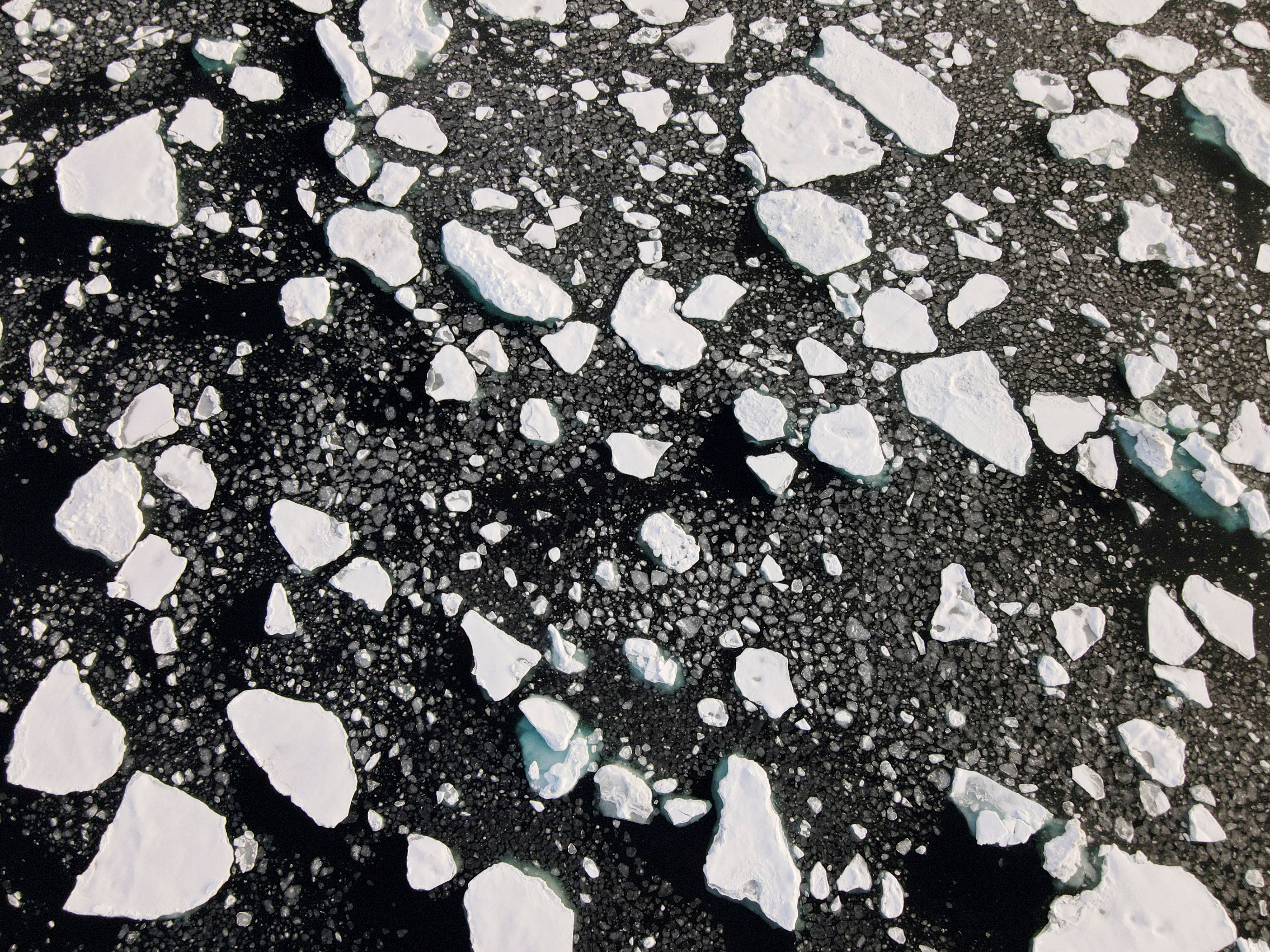An aerial view of floating ice in the Arctic Ocean
