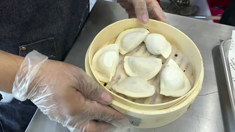 Dumplings are prepared at the Brooklyn Dumpling Shop, which is offering items through an automat, in New York City