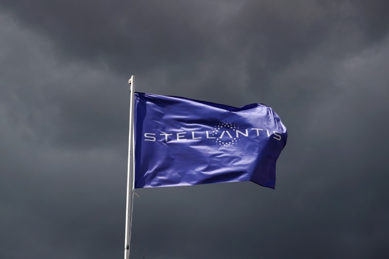 A flag with the logo of Stellantis is seen near Paris
