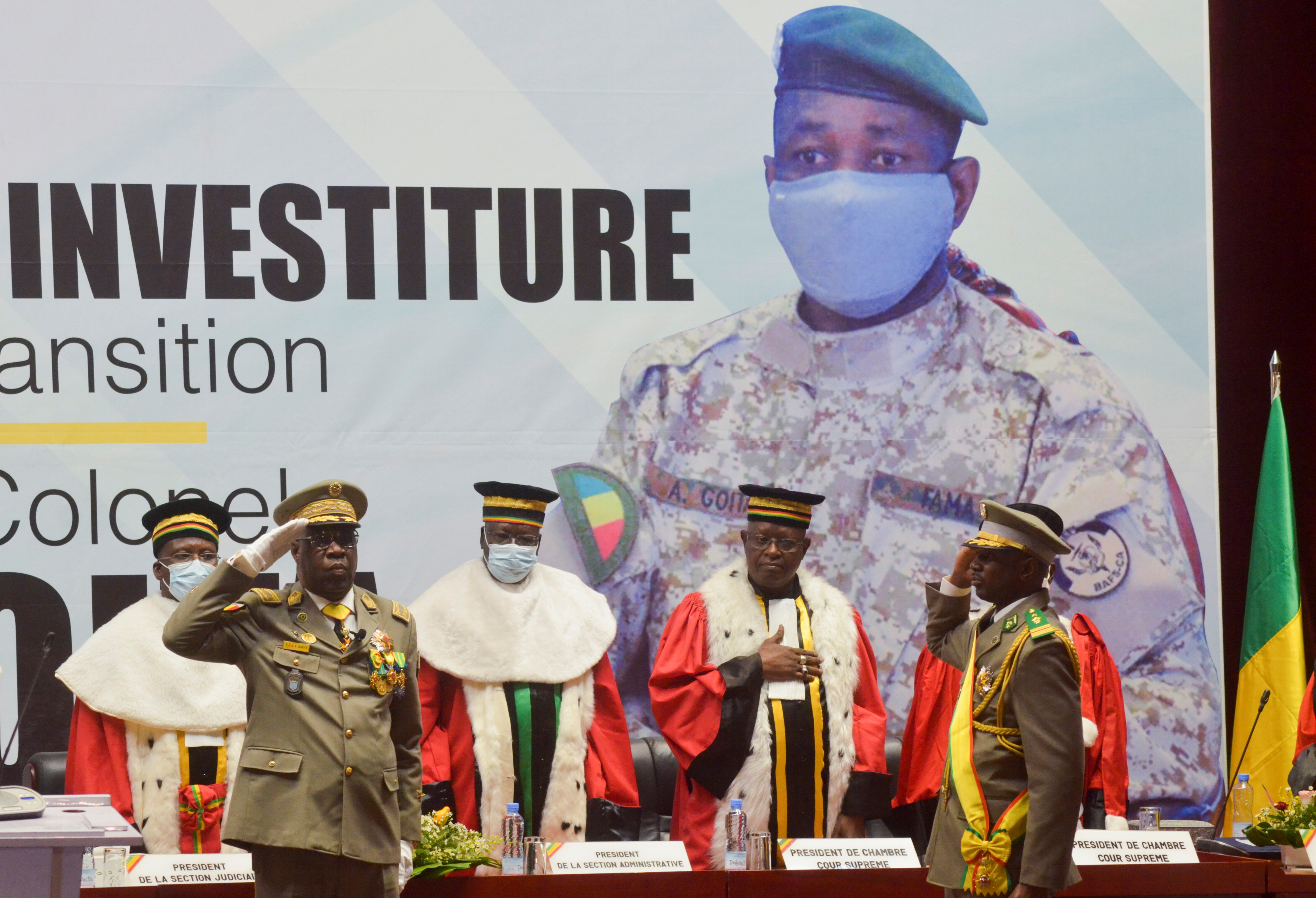 Colonel Assimi Goita, leader of two military coups and new interim president, stands during his inauguration ceremony in Bamako