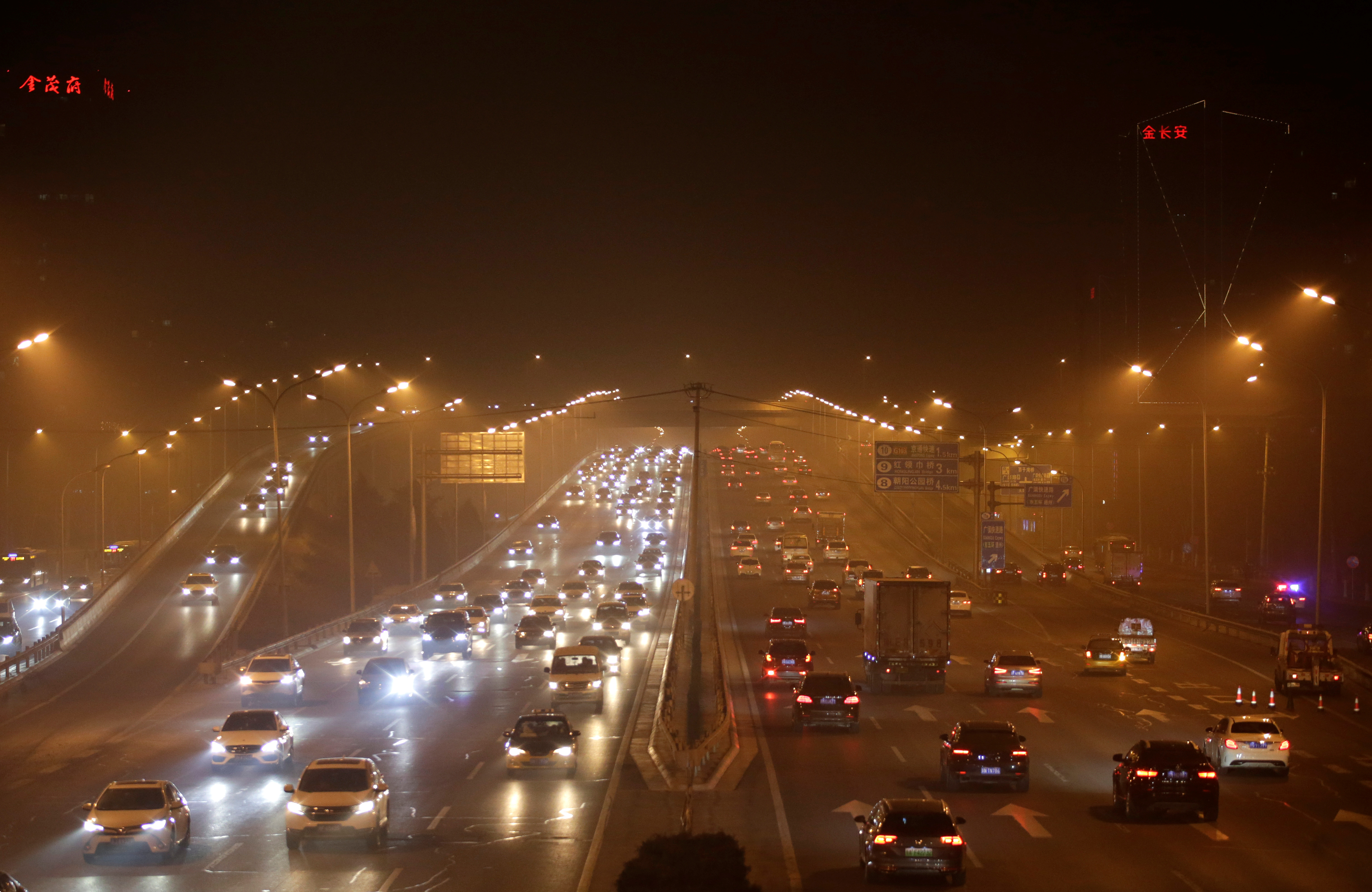 Vehicle drive amid the heavy haze at night in Beijing