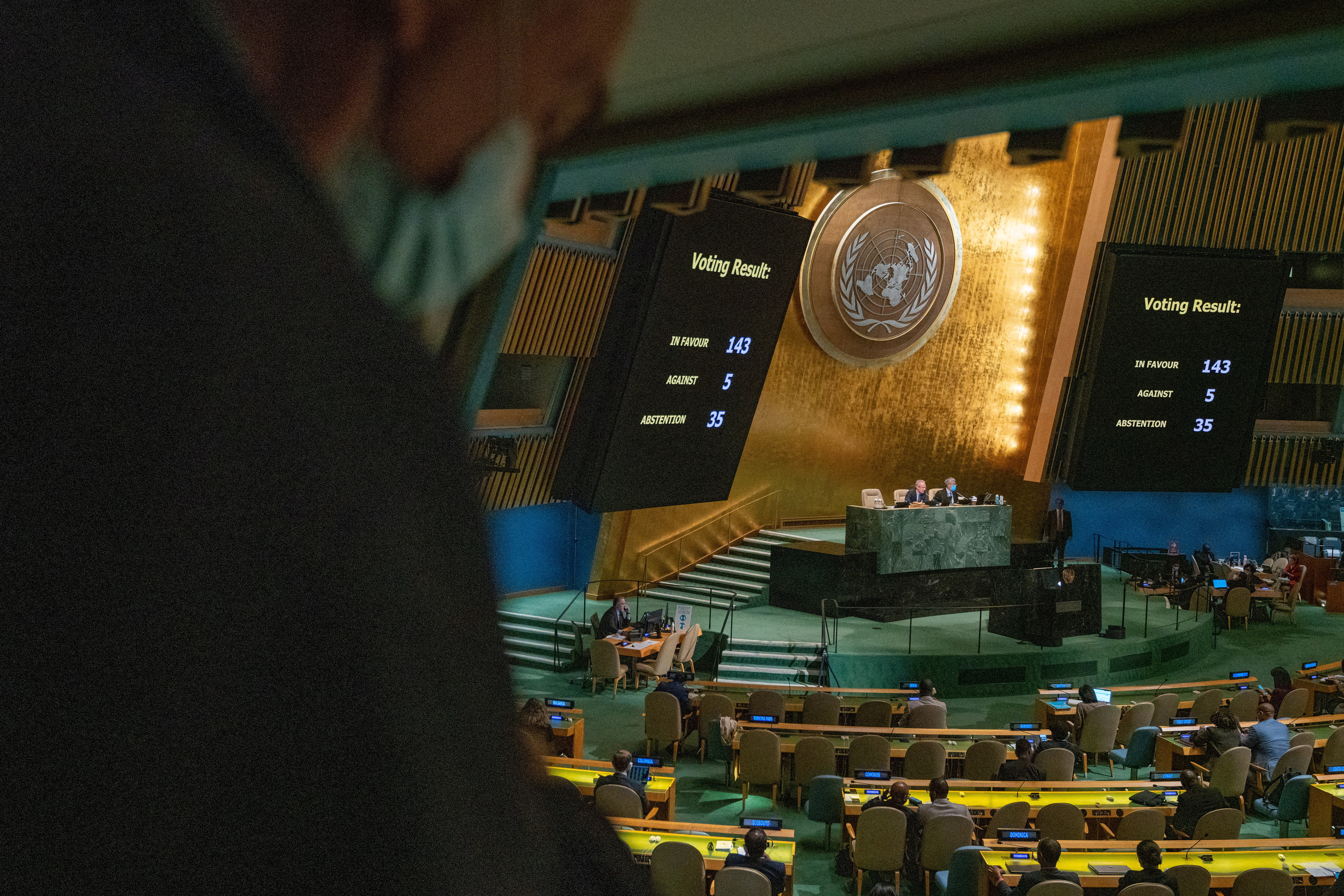 The monitors at the United Nations General Assembly hall display a vote to resolution condemning the annexation of parts of Ukraine amid Russia's invasion of Ukraine, at the United Nations Headquarters