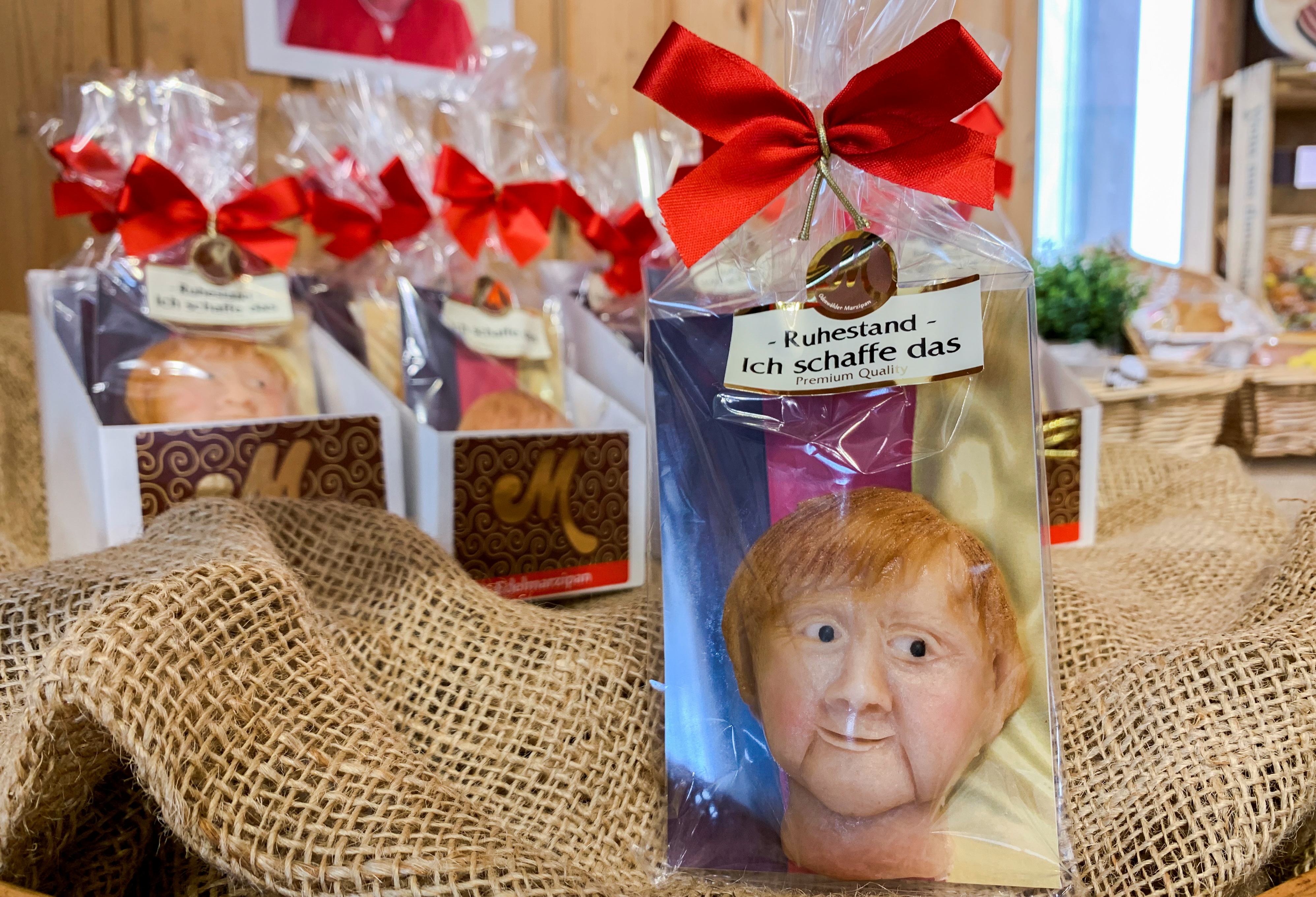 Marzipan cookies depicting German Chancellor Angela Merkel made by a German confectioner ahead of the September 26 elections, are displayed in Weilbach, Germany, September 14, 2021. REUTERS/Annkathrin Weis