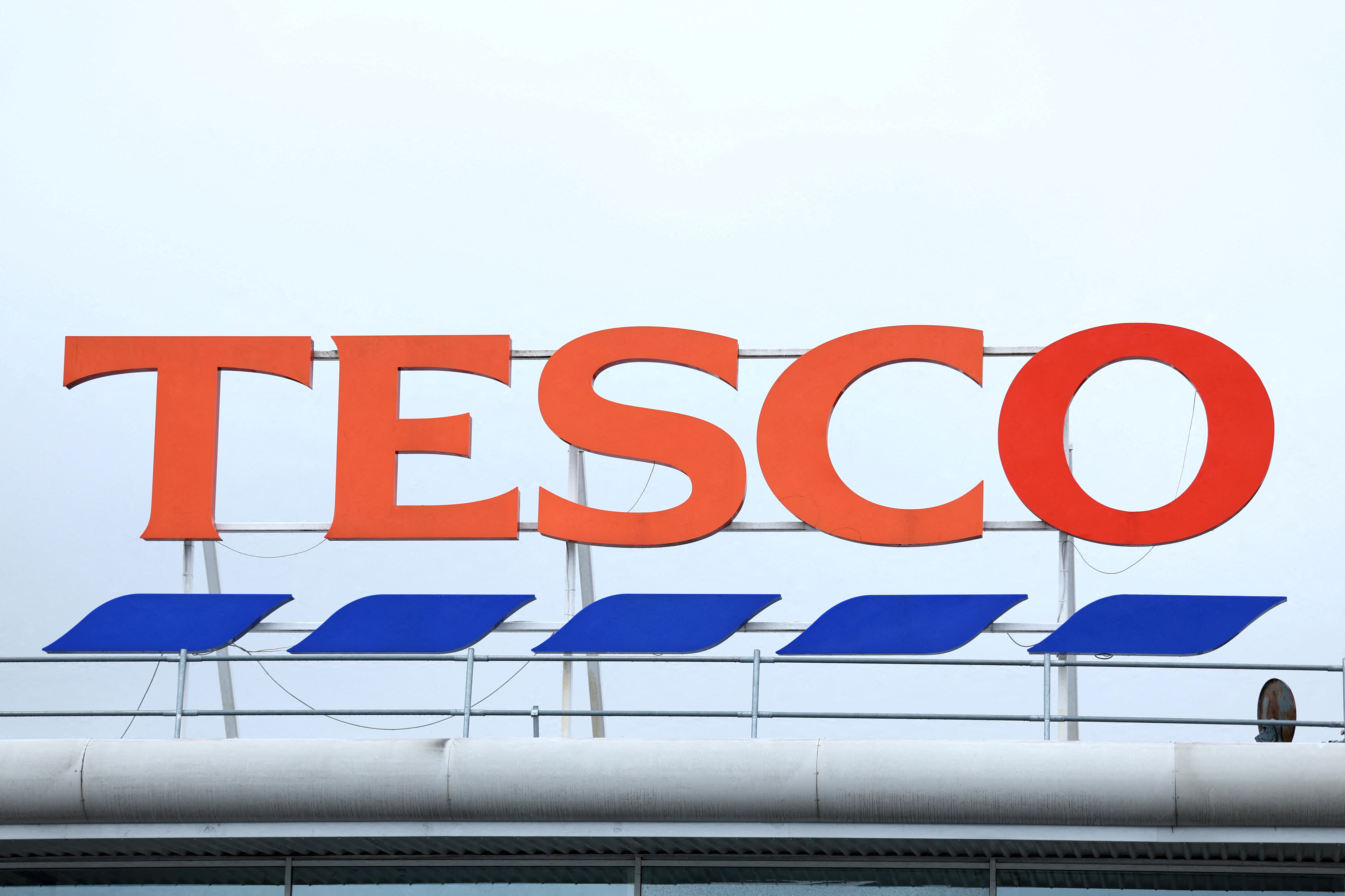 As Britons target cheaper food, Tesco cuts branded products in
