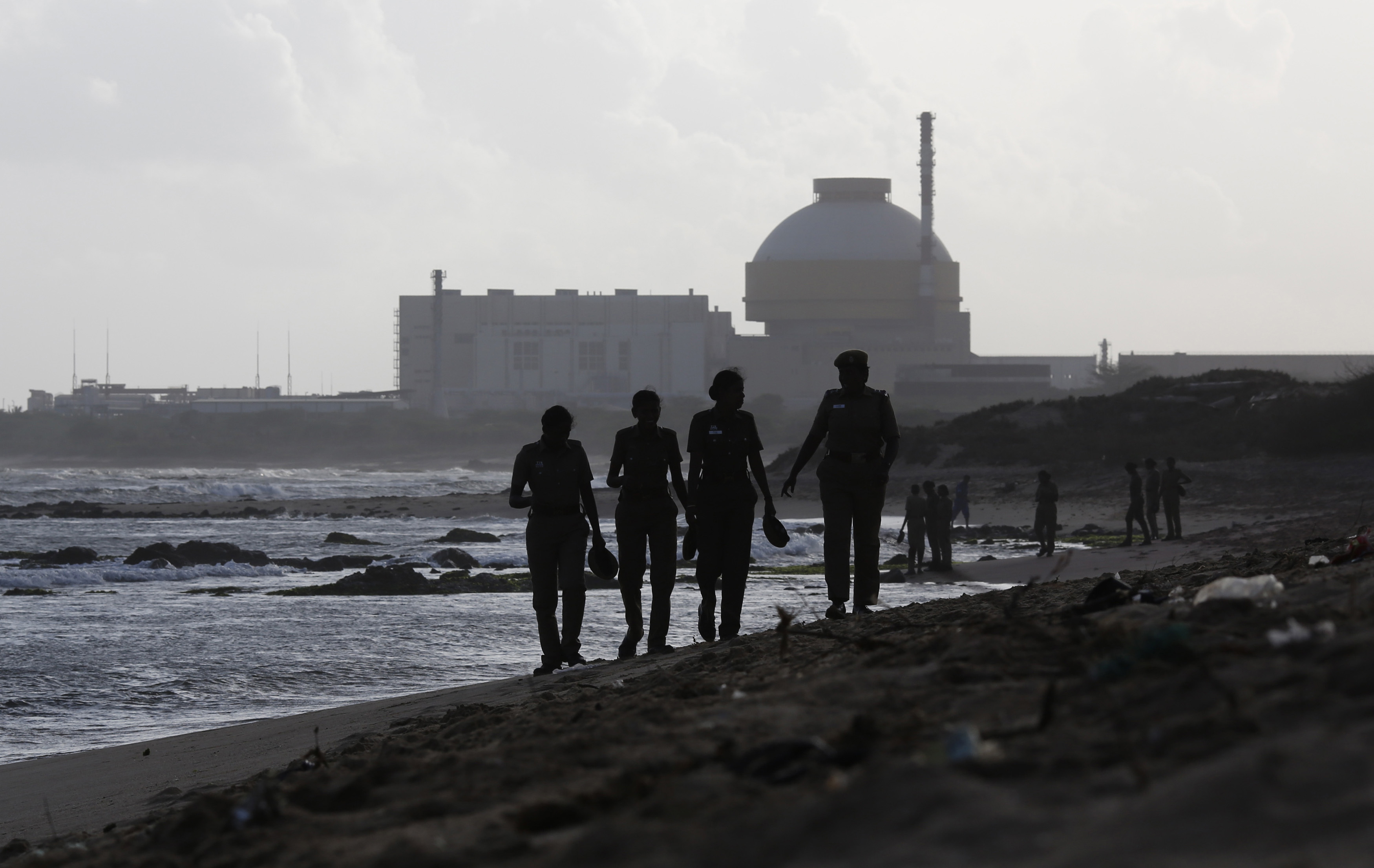 Police patrol on a beach near Kudankulam nuclear power project-