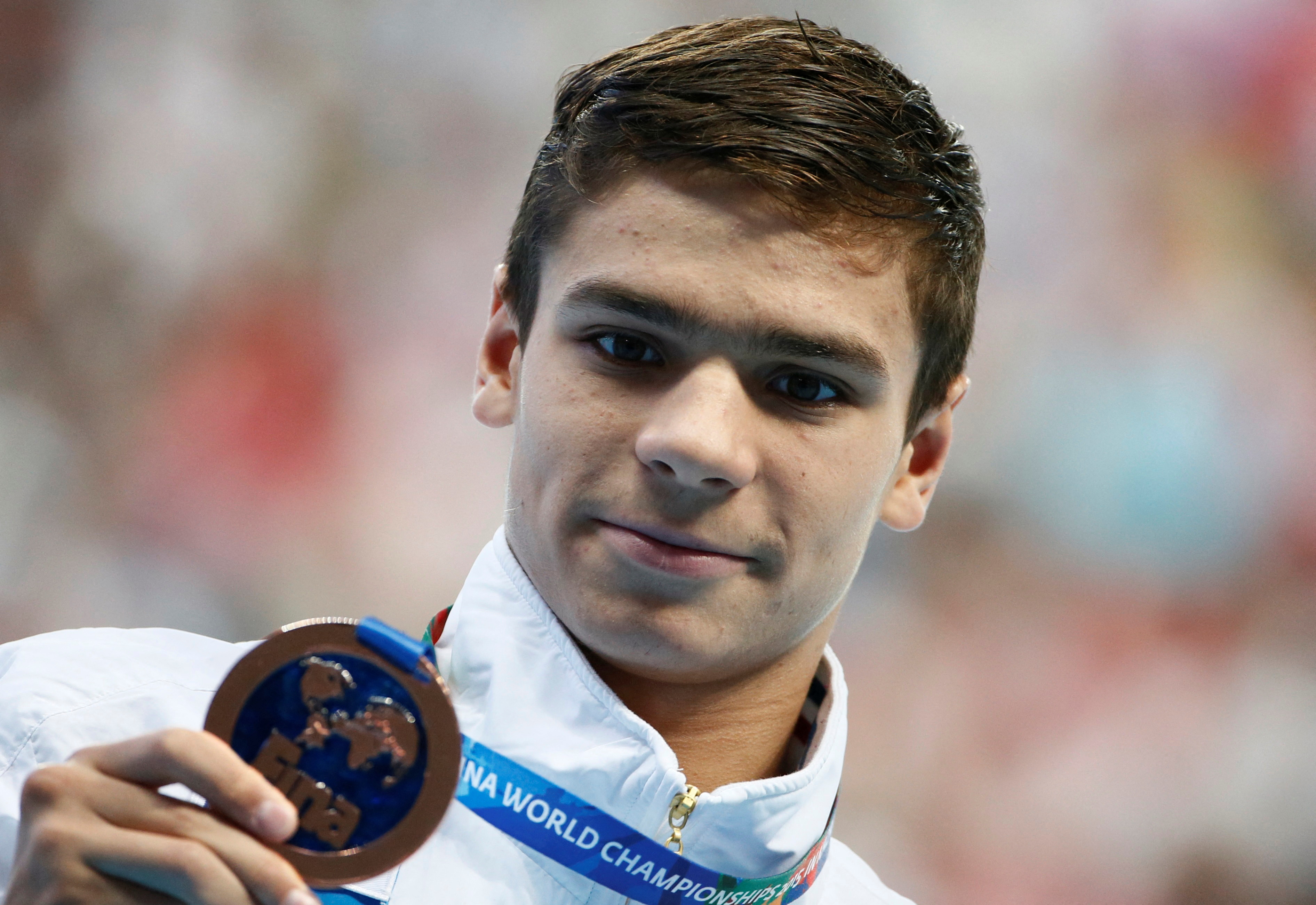 Russia's Rylov celebrates with bronze medal after men's 200m backstroke final at Aquatics World Championships in Kazan