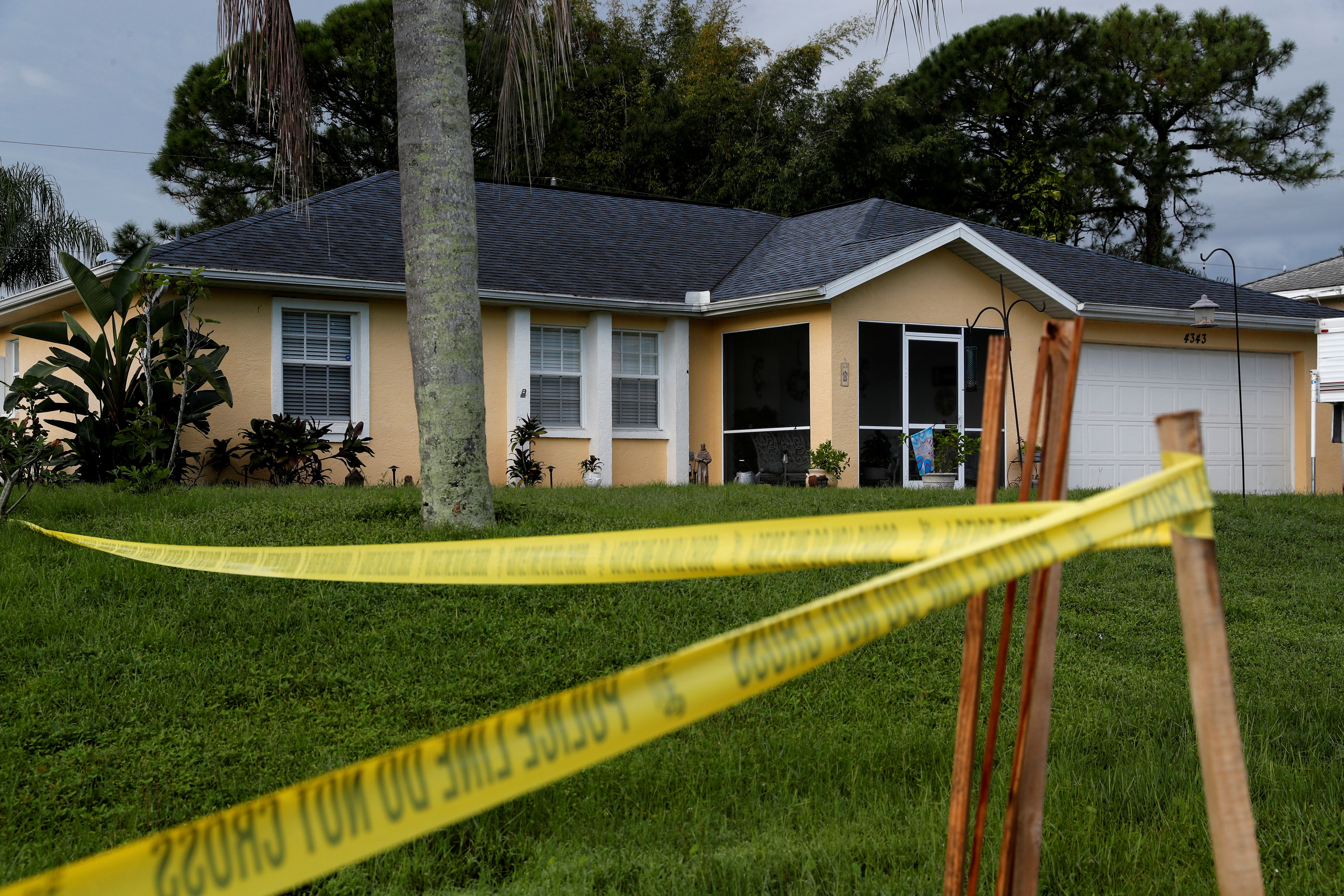 Police tape is seen outside the family home of Brian Laundrie, in North Port, Florida